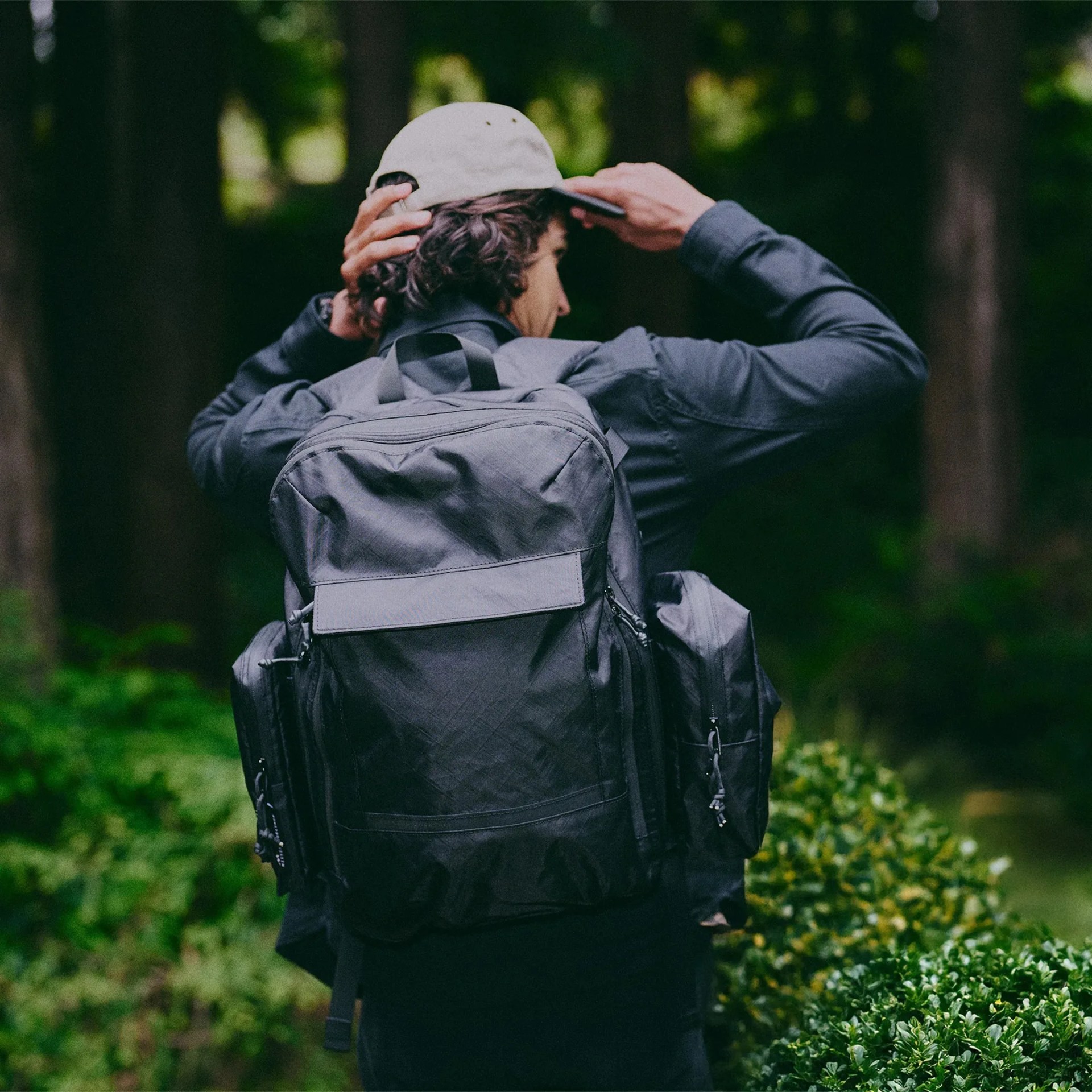 Mission Workshop Meridian Backpack on person in forest locale