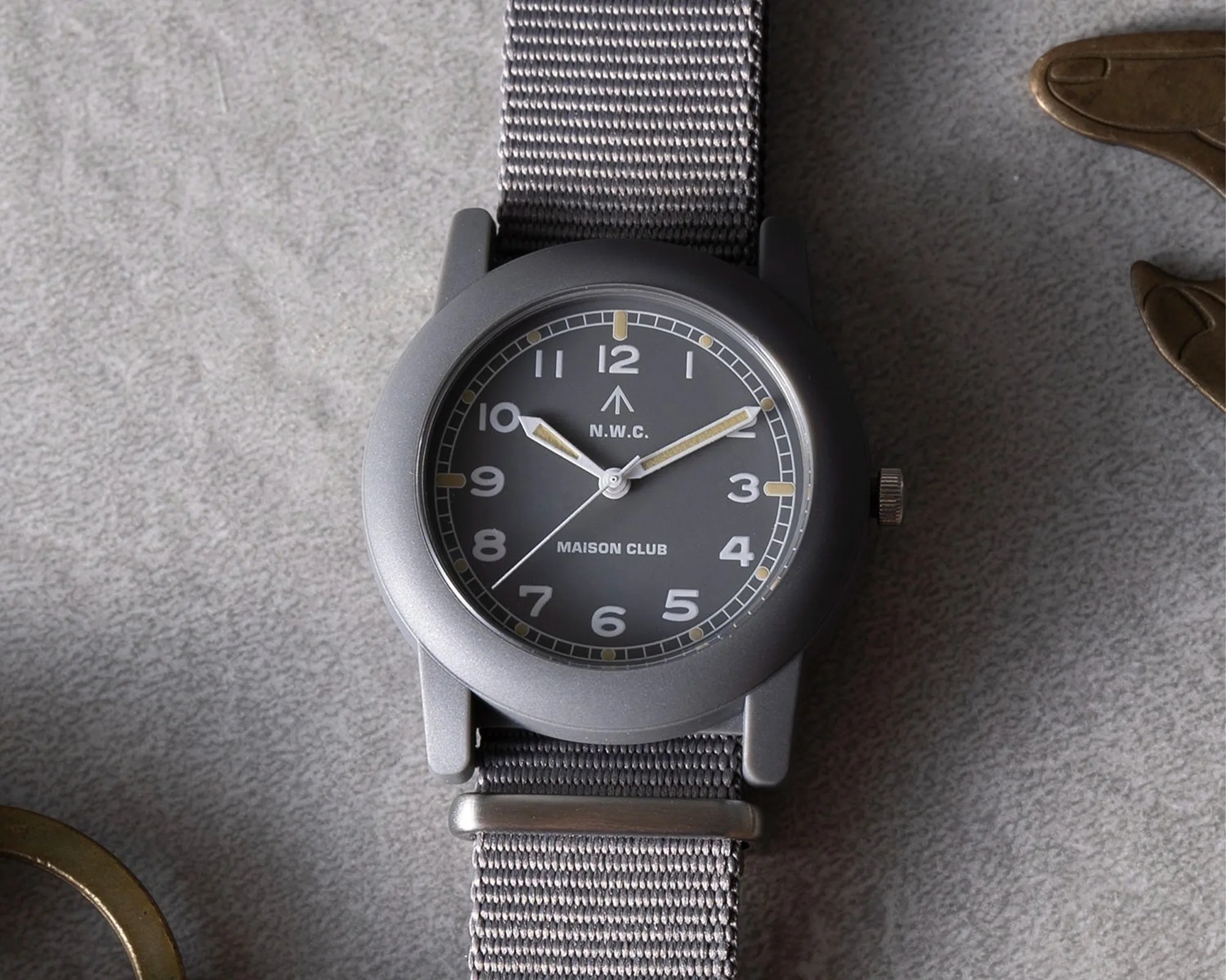 Naval Watch x Maison Club Mil 08 Field Watch gray dial closeup