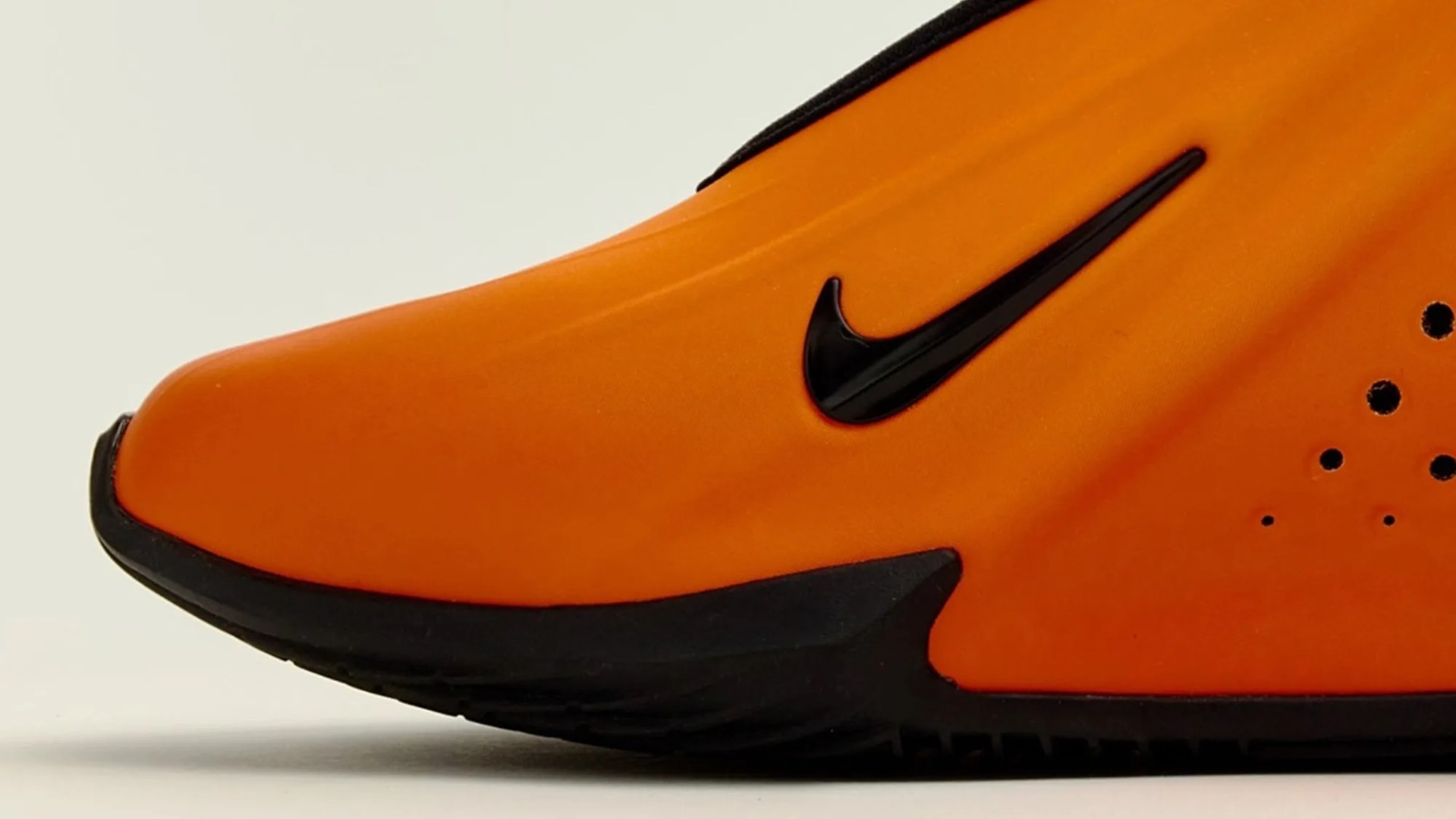 Nike G.T. Future Sneaker in orange, toe closeup