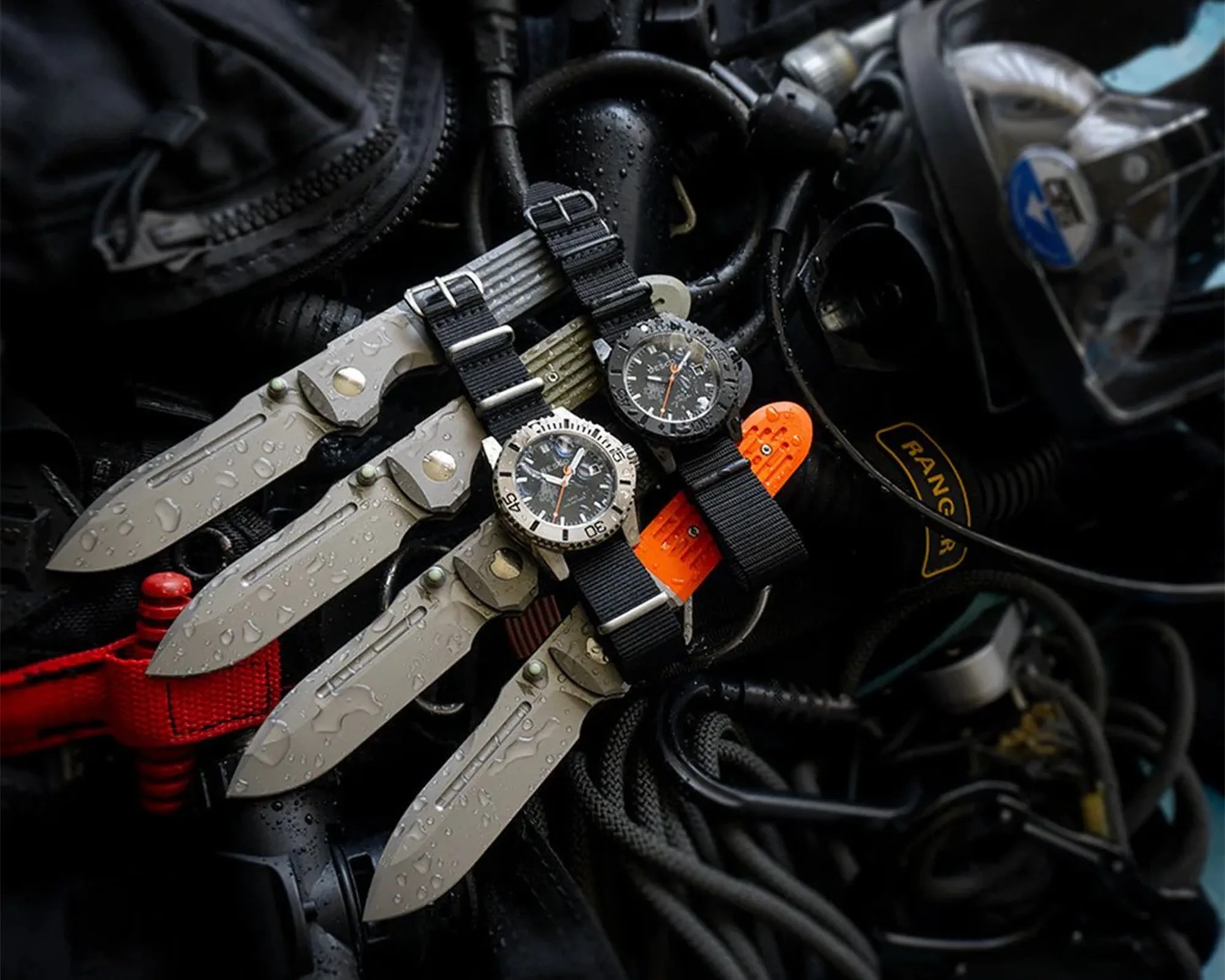 Prometheus Design Werx SPD x Resco UDT PVD Dive Watches on knives and dive gear