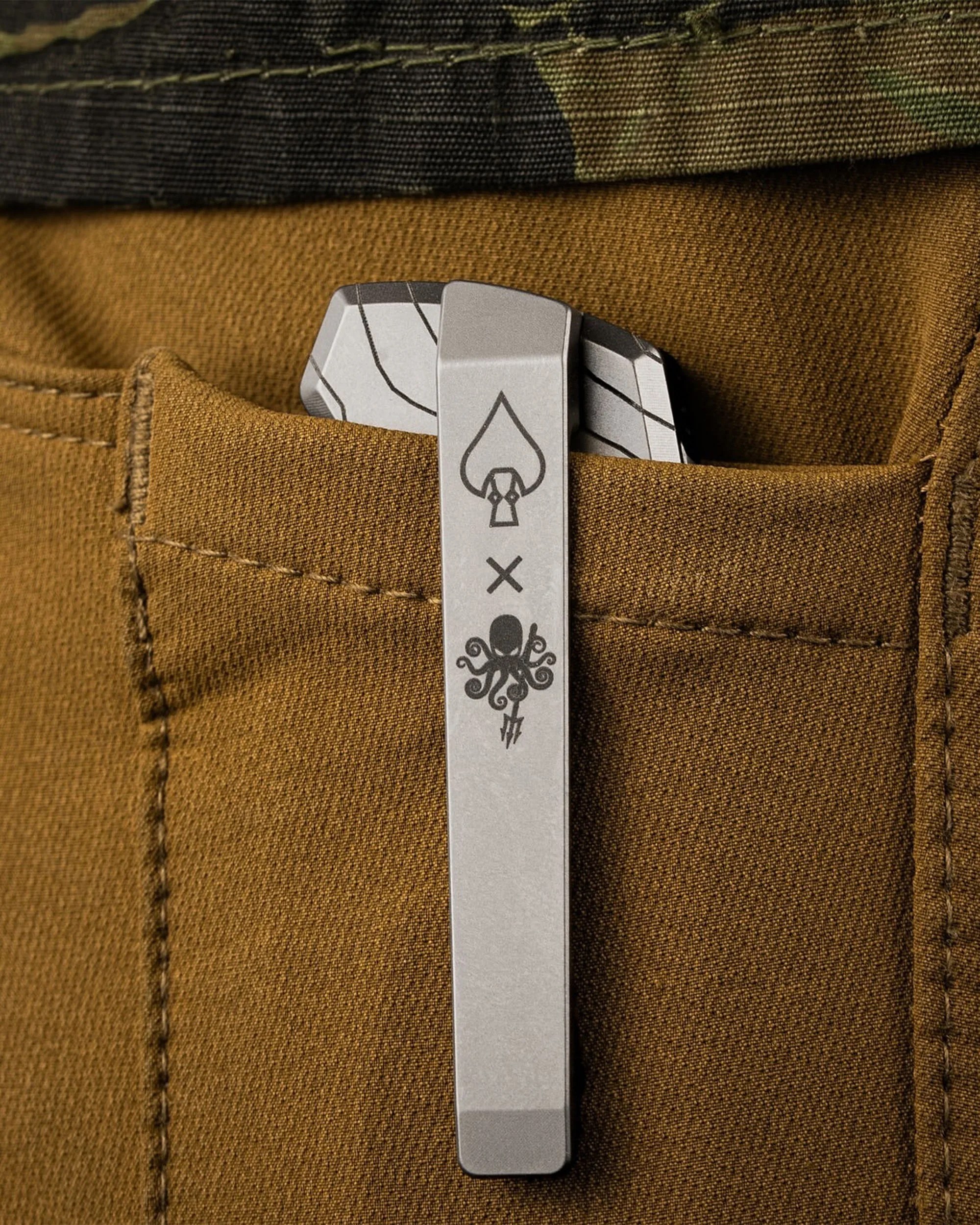 Prometheus Design Werx x Watches of Espionage Birdwatcher knife in pocket with clip sticking out