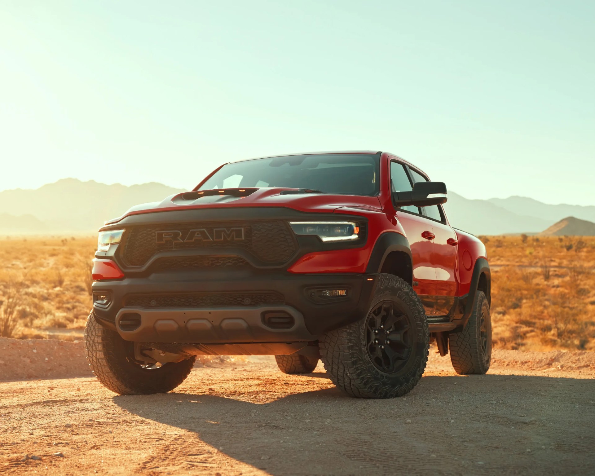 red ram 1500 TRX parked desert backdrop