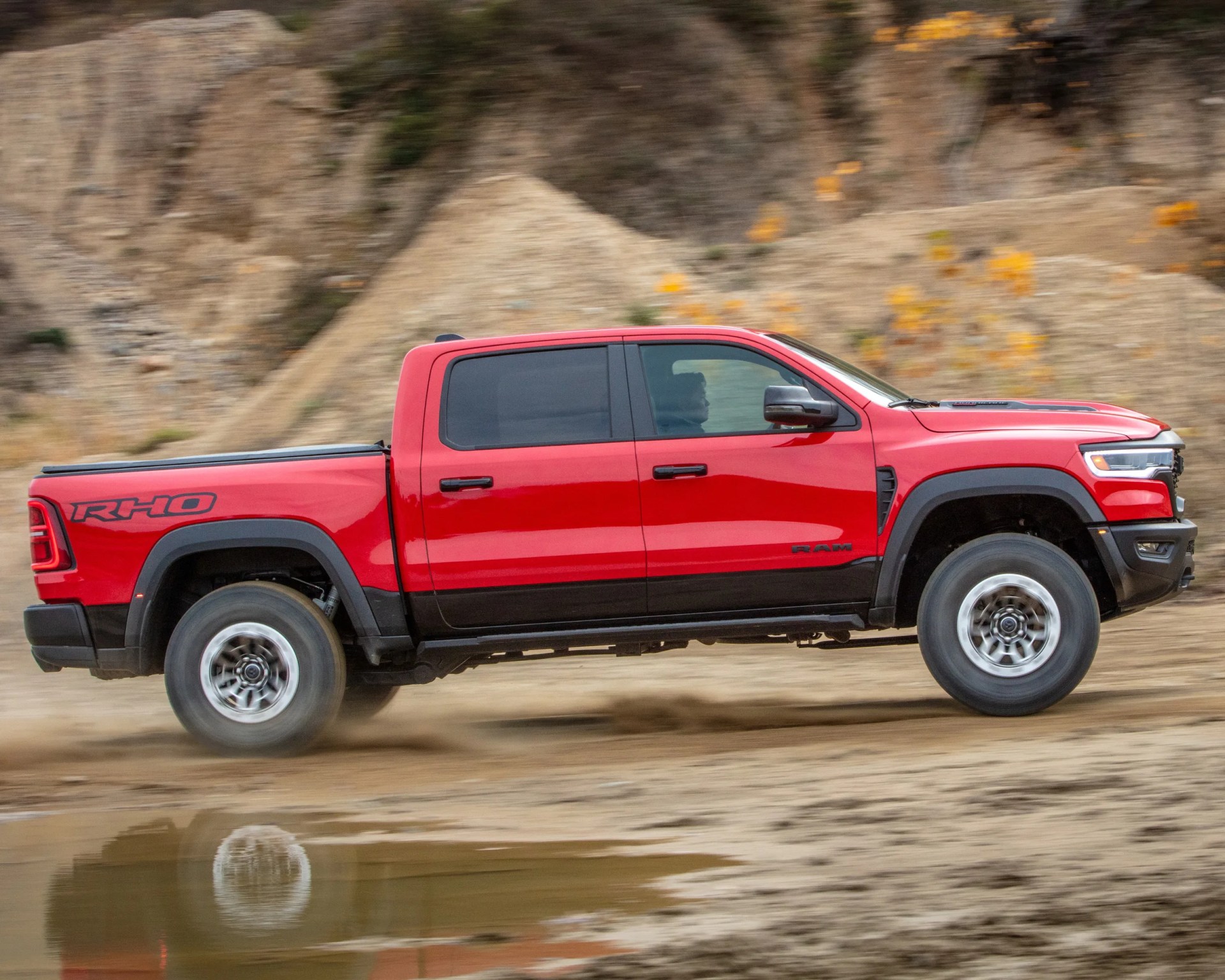 red Ram RHO truck driving panning shot