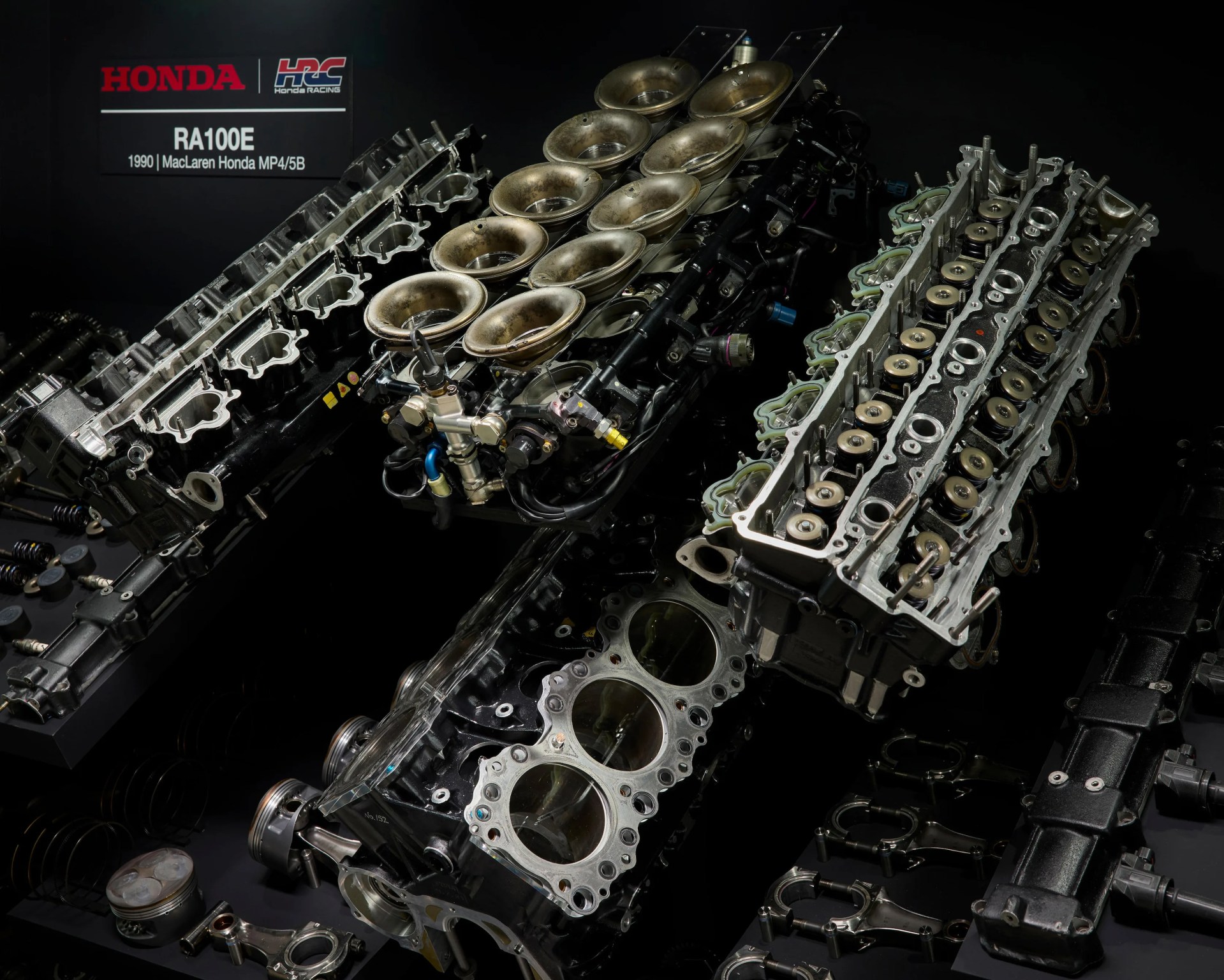 a moody shot of a disassembled honda f1 engine