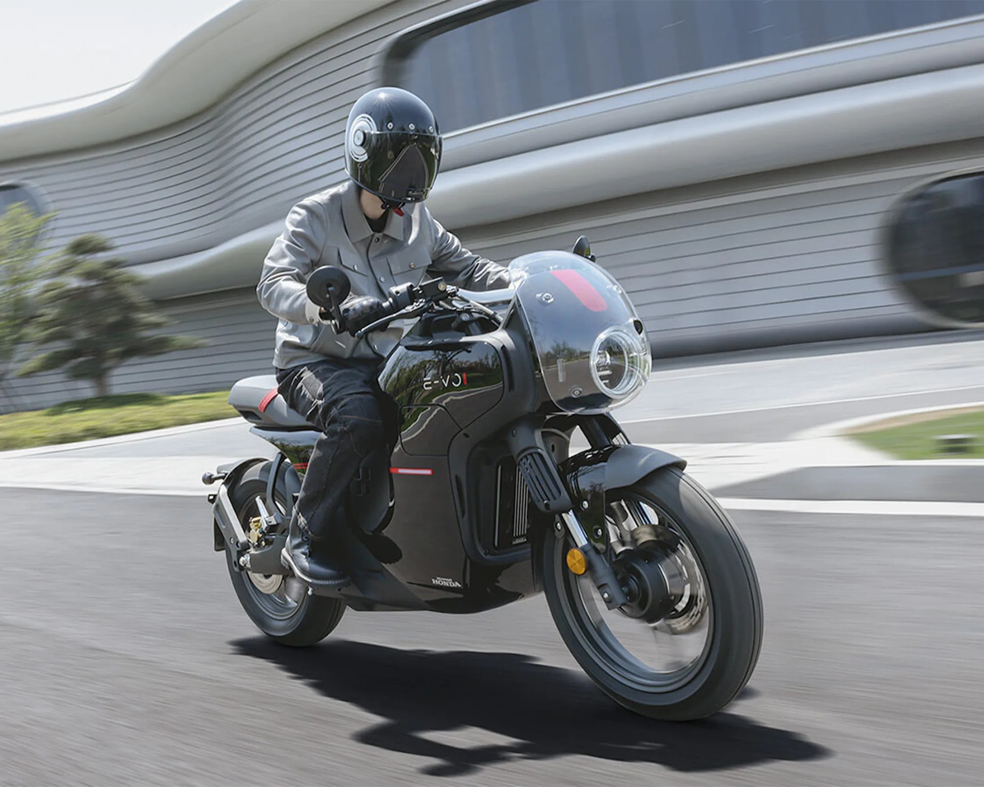 Wuyang-Honda E-Vo Electric Motorcycle ridden on city street