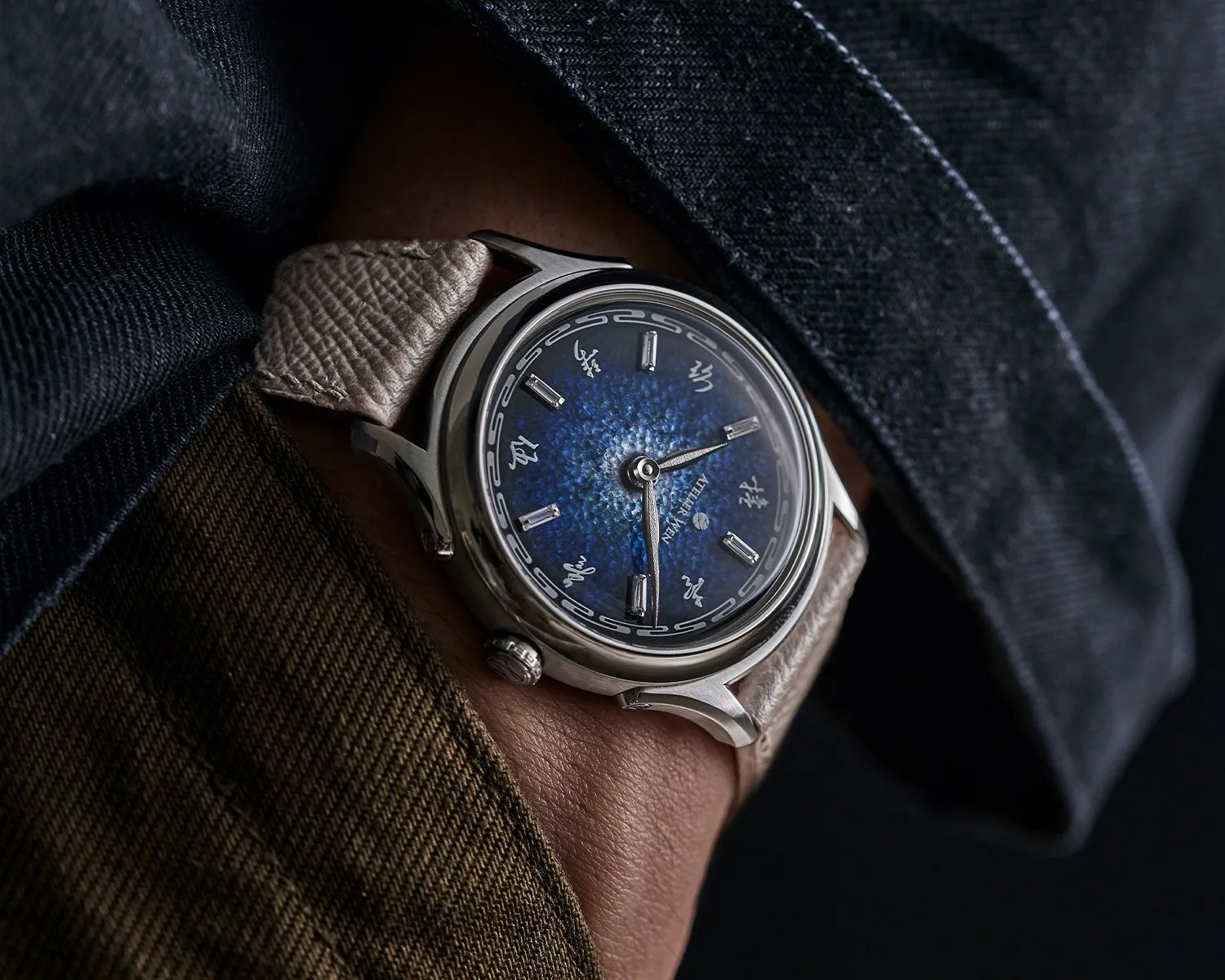 an atelier wen watch on a mans wrist