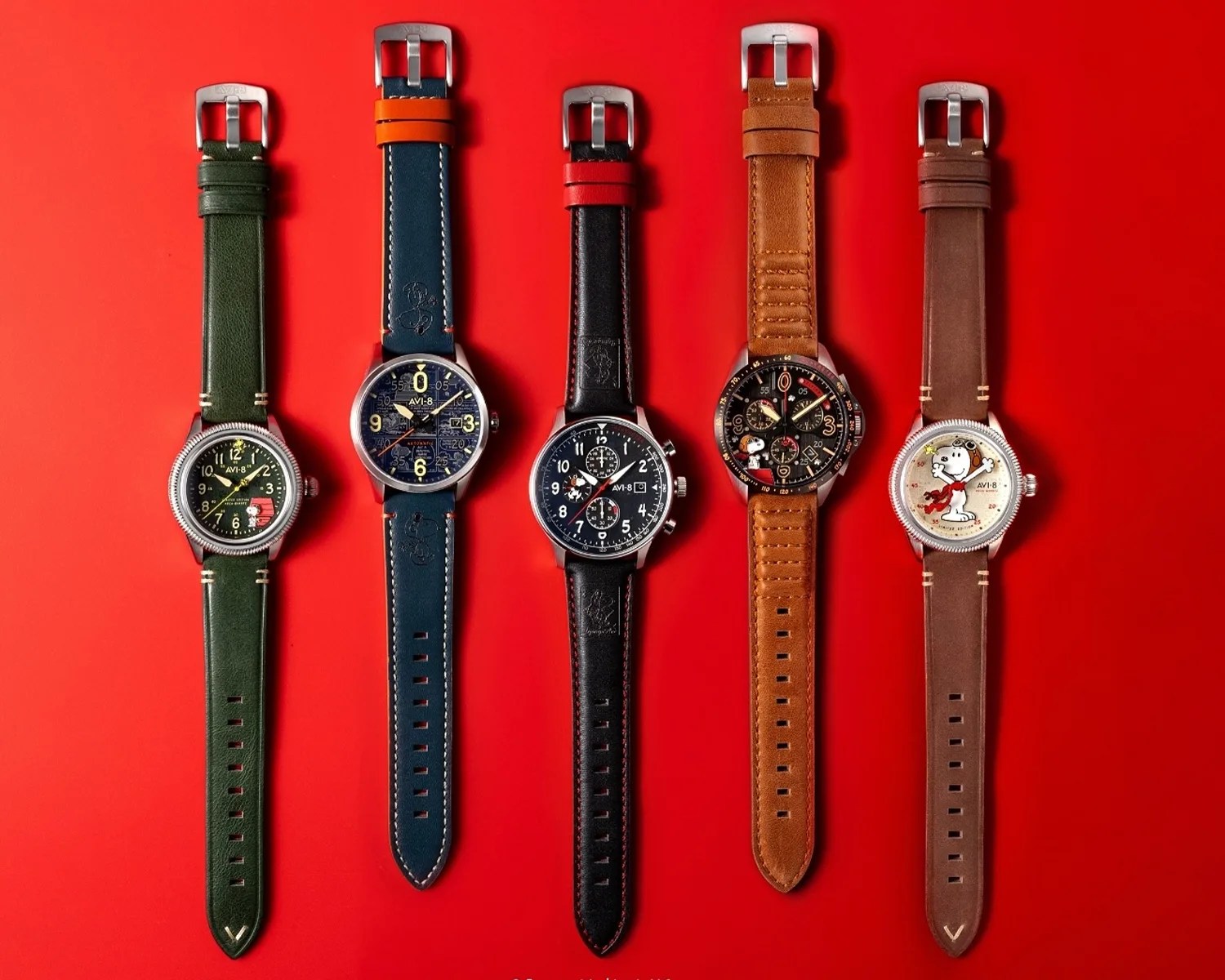 a lineup of five avi 8 snoopy watches