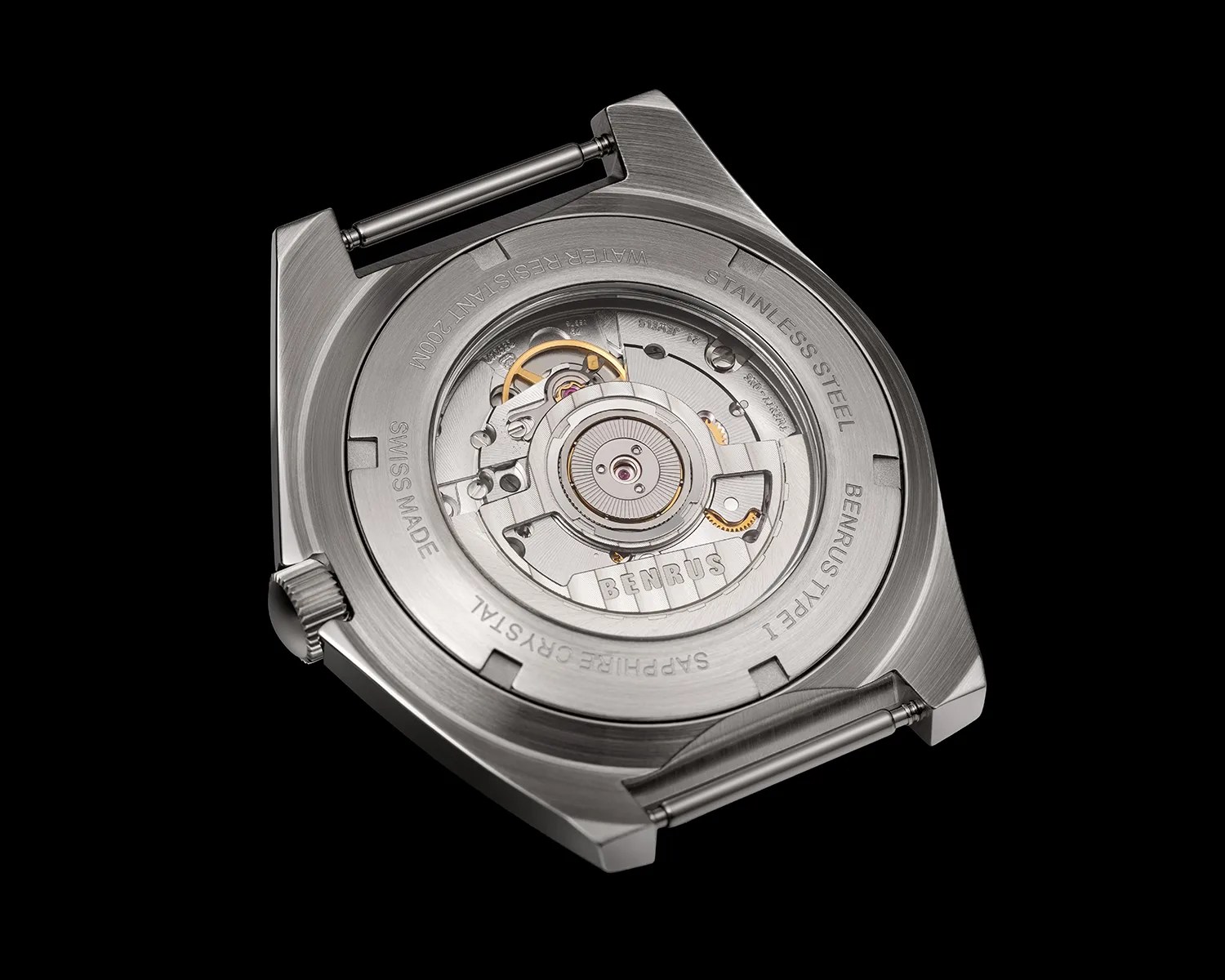 a benrus watch caseback with a display window showing the movement