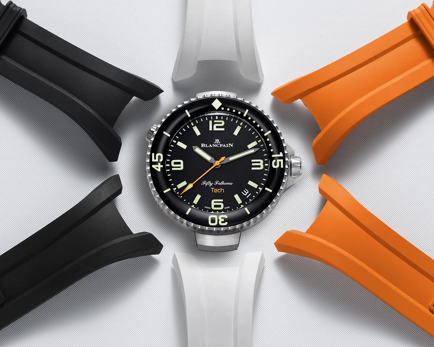 a Blancpain dive watch with several rubber straps