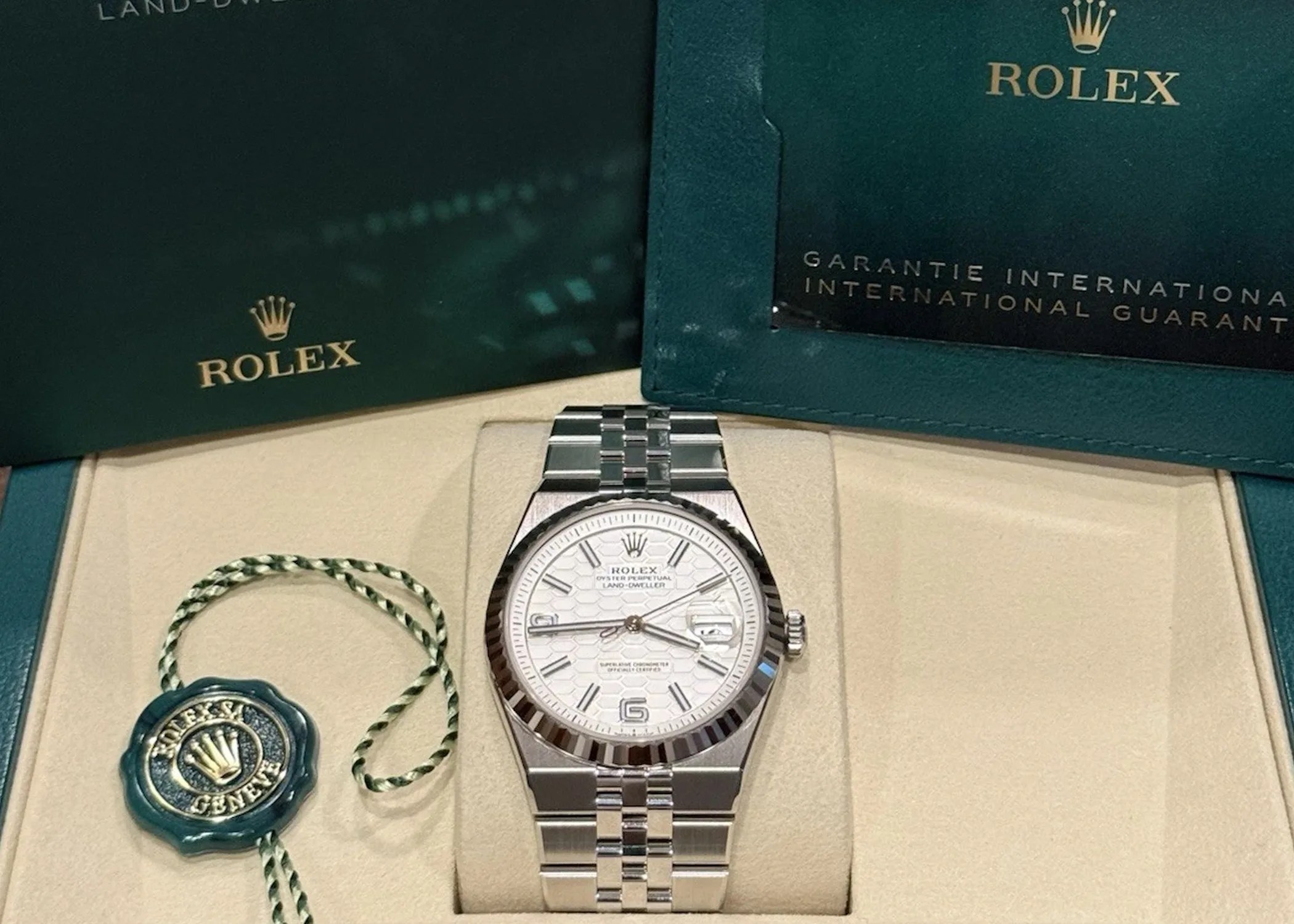 a rolex watch in a box