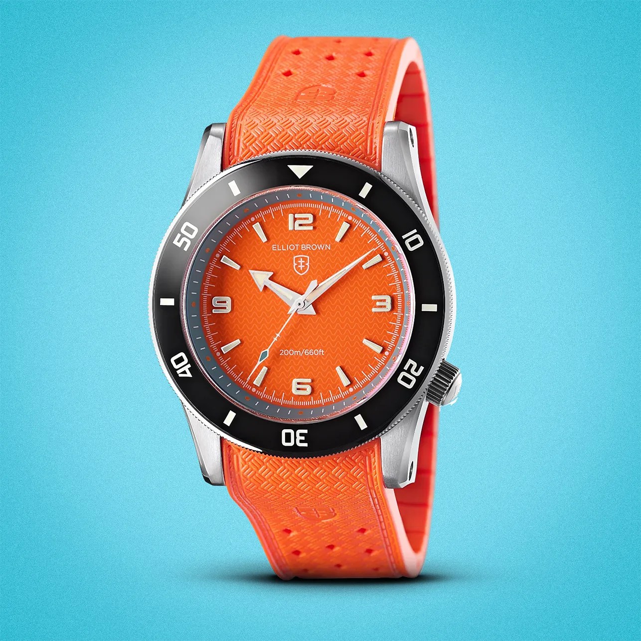 an orange Elliot Brown dive watch