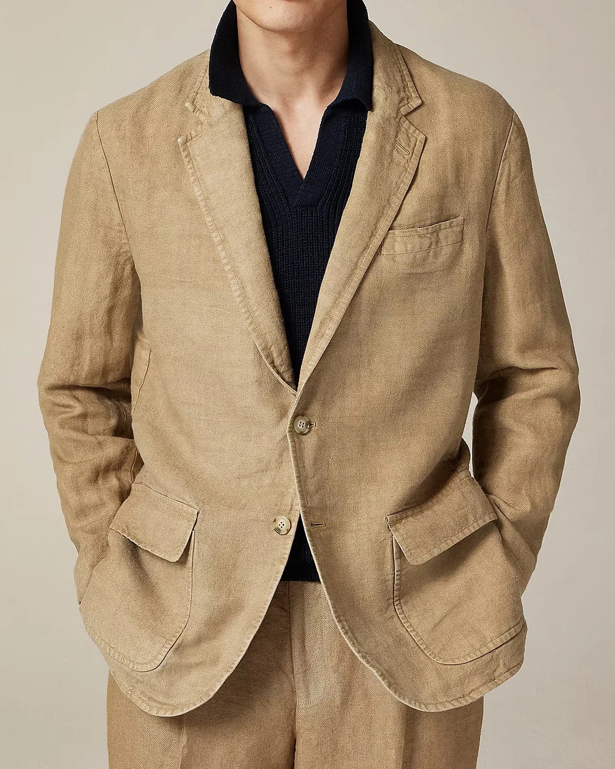 a man wearing a J.Crew linen suit