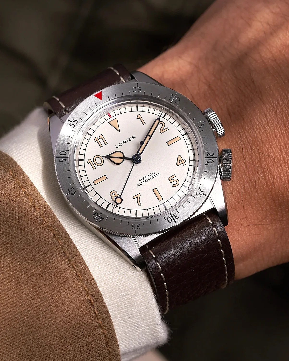 a Lorier watch on a man's wrist