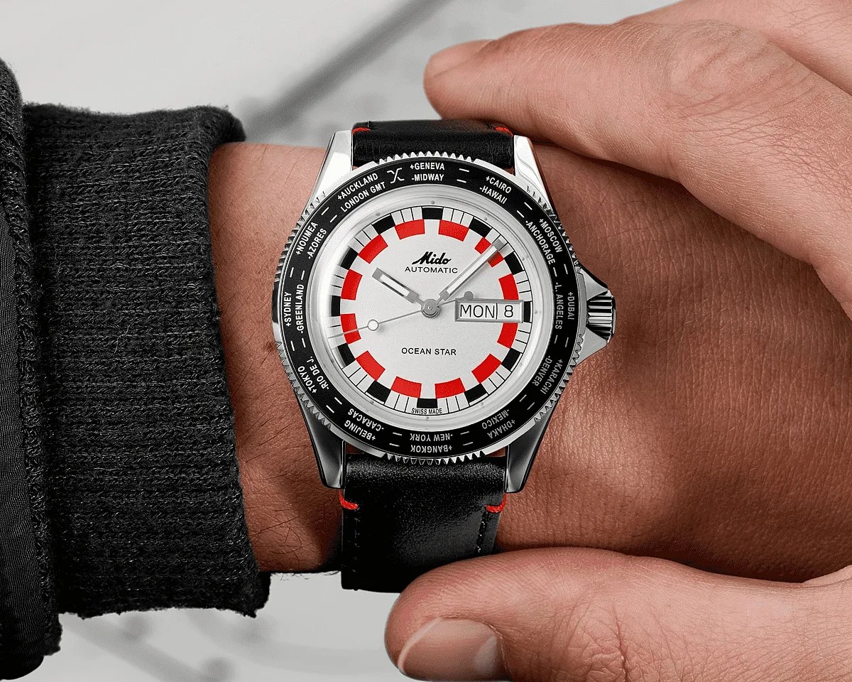 a Mido watch on a man's wrist