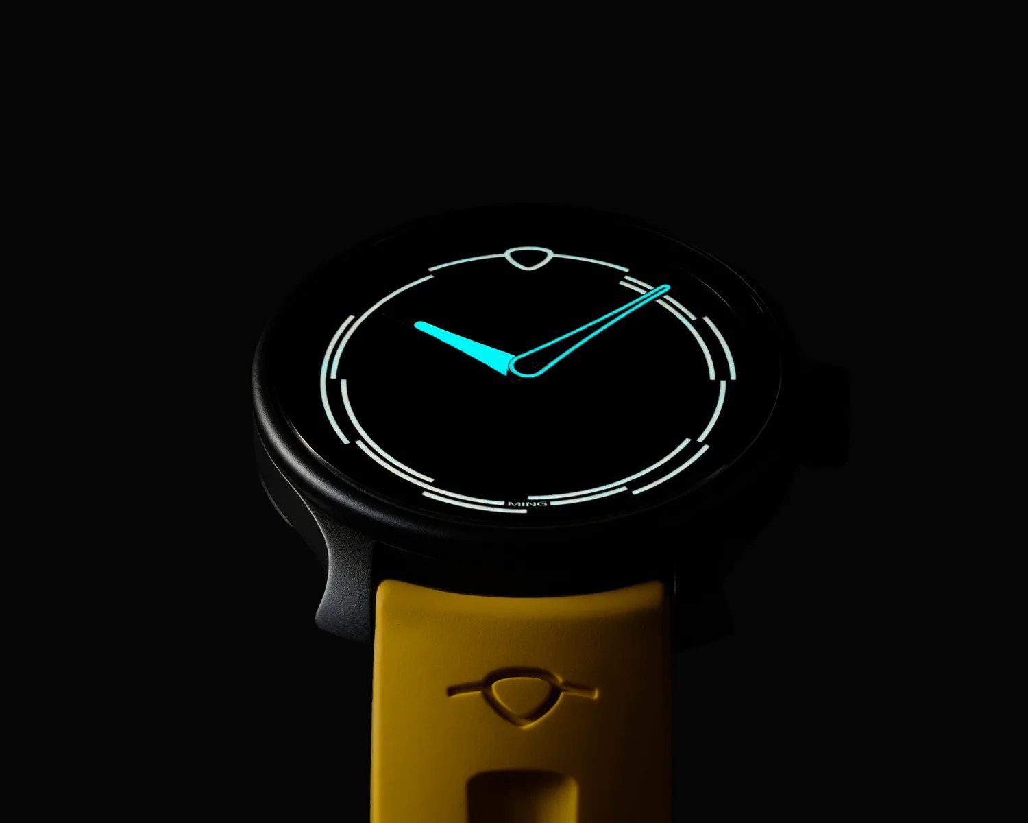 a ming watch glowing in the dark
