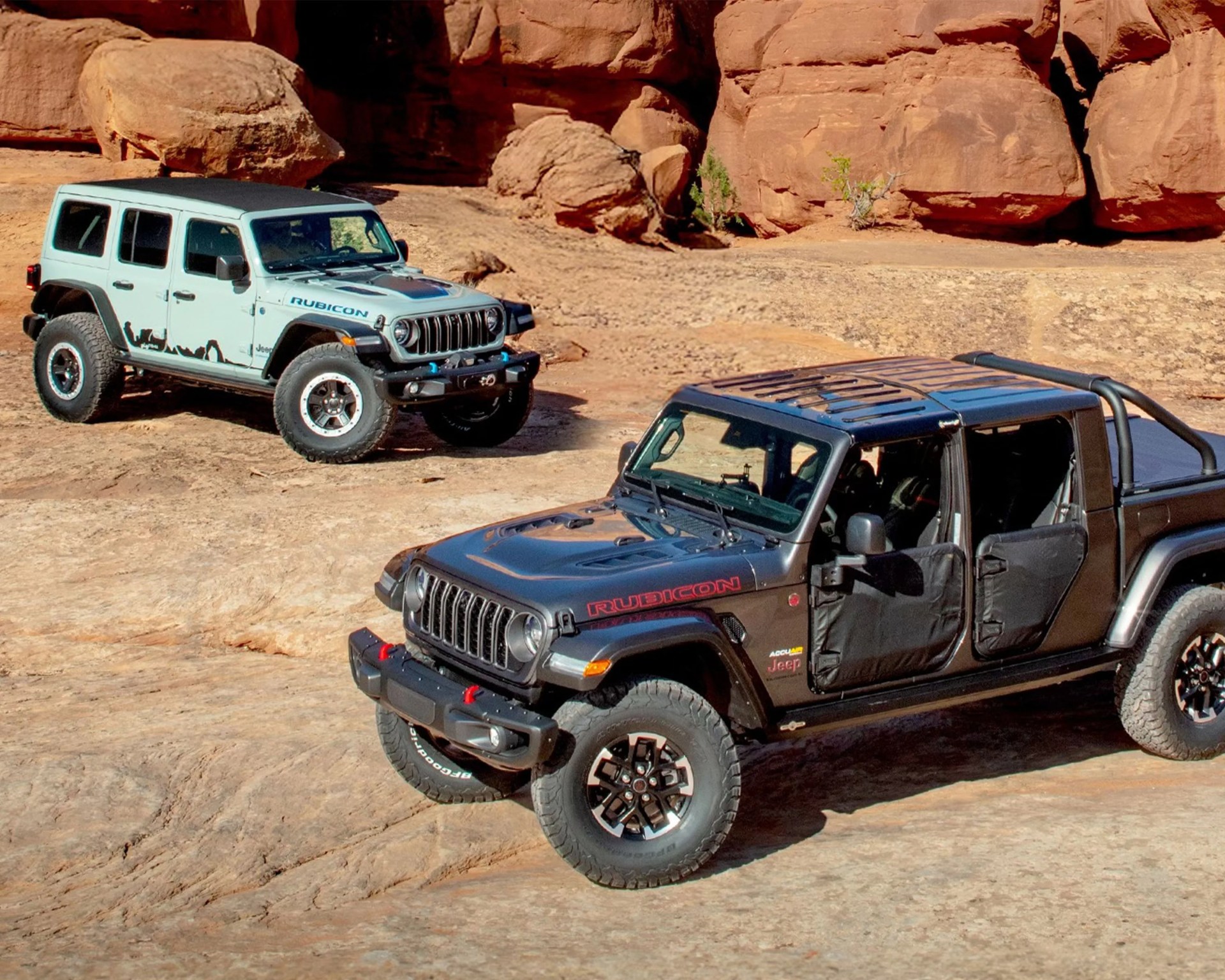 two jeeps in a desert setting