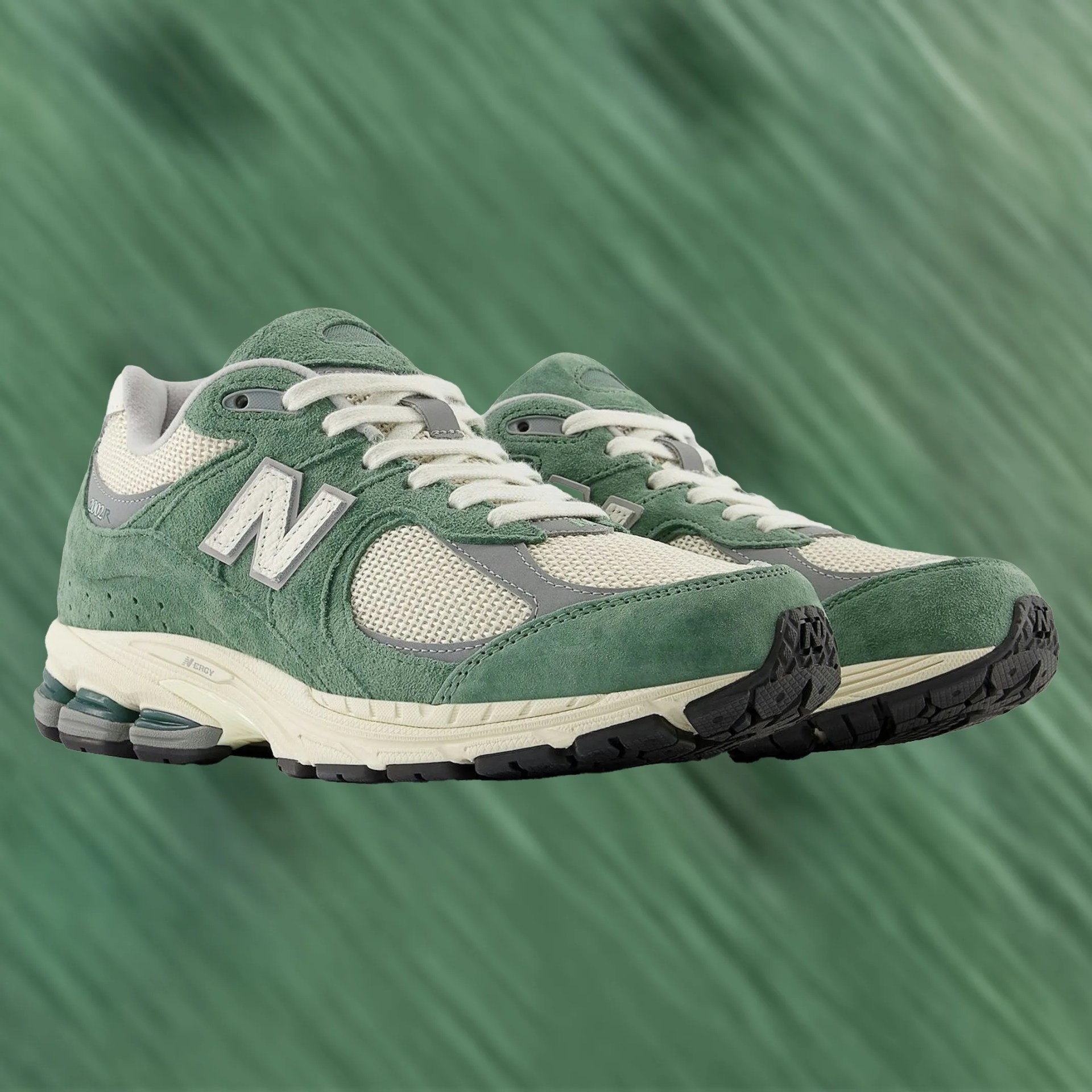 a pair of new balance sneakers
