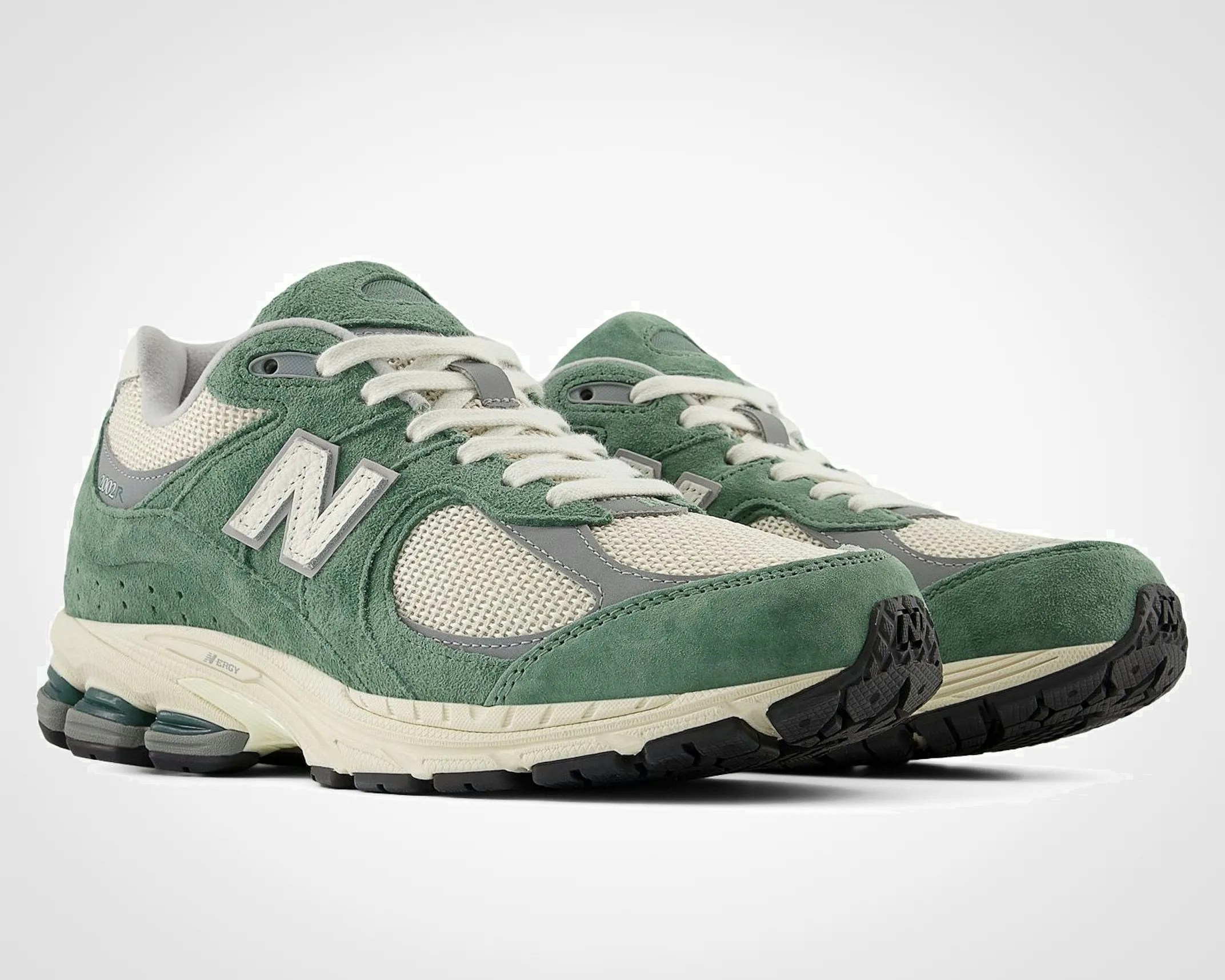 a pair of new balance sneakers