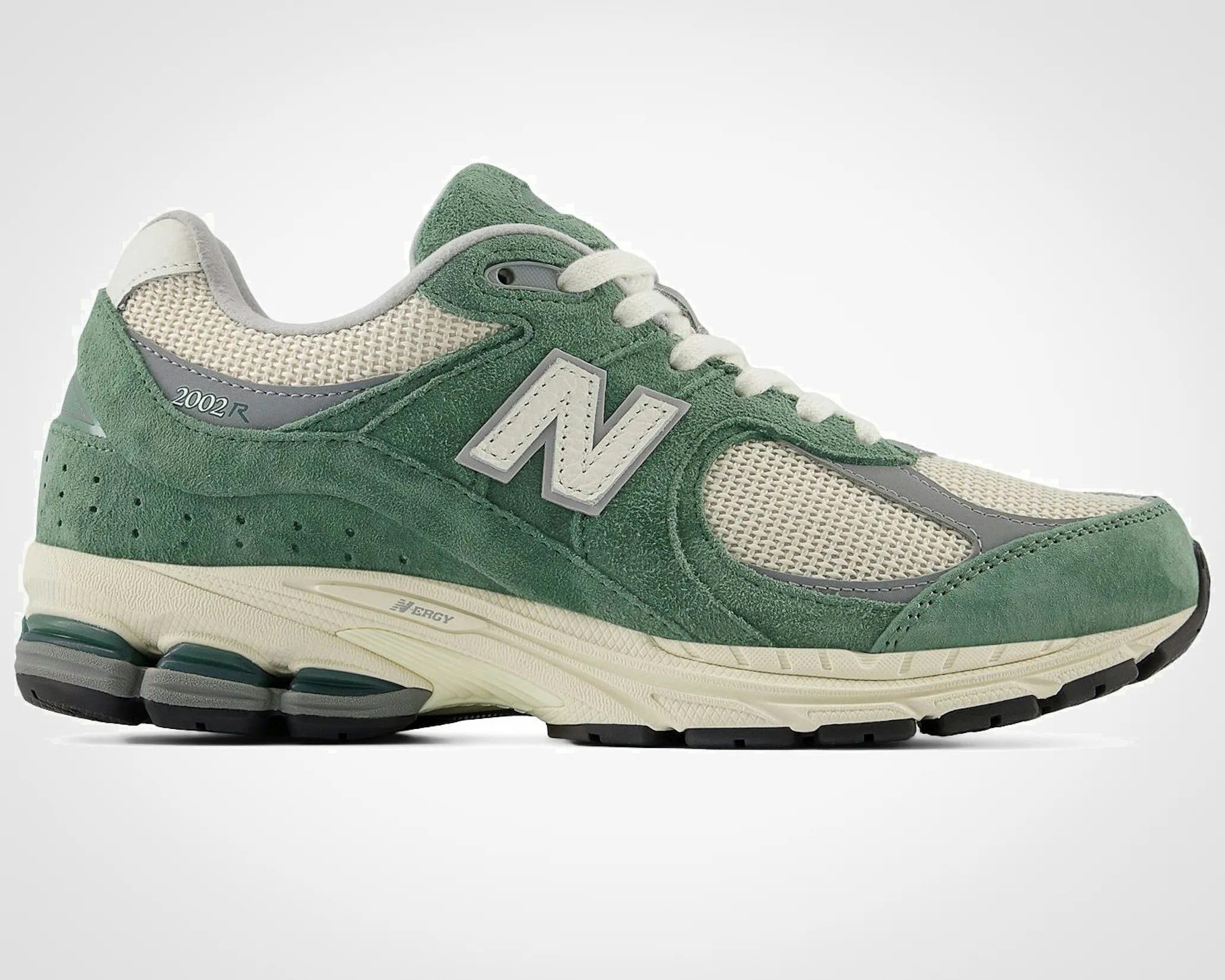 the side of a green New Balance sneaker