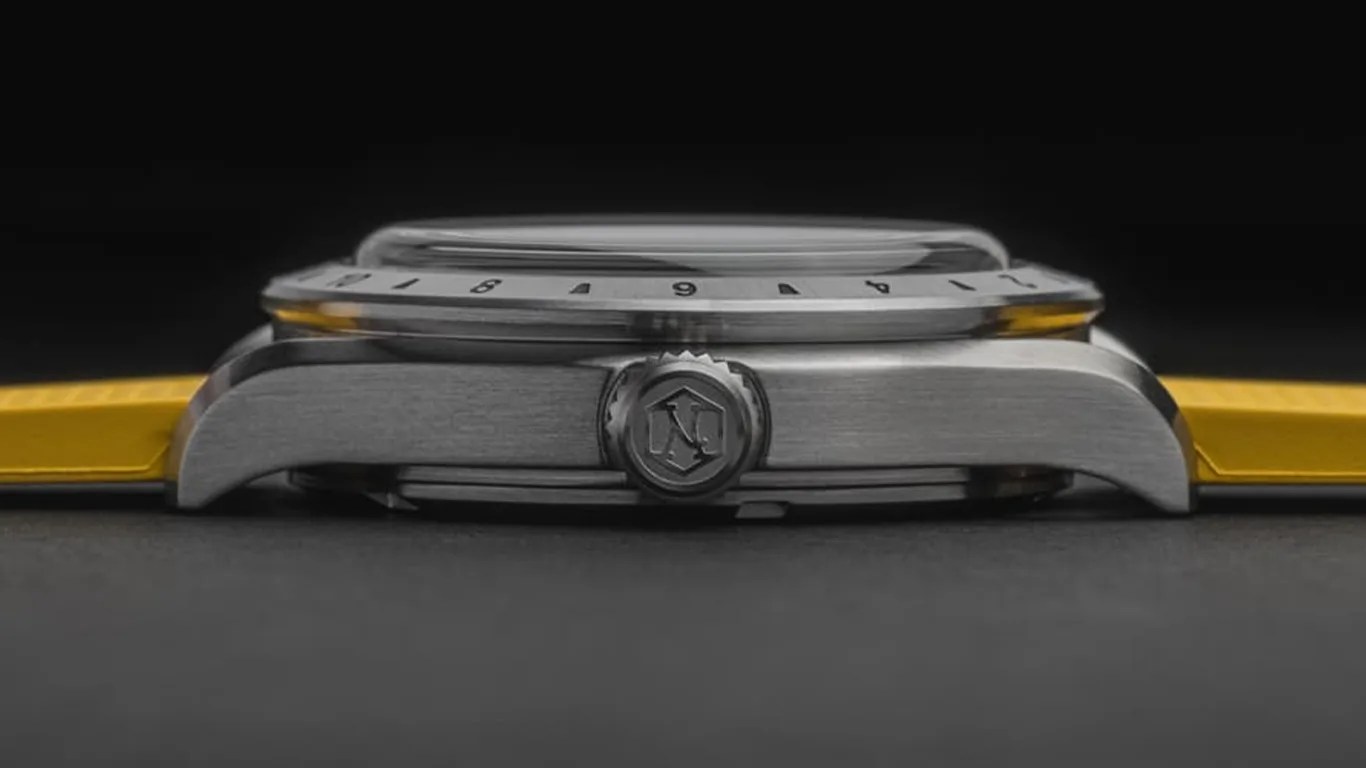 a nezumi gmt watch viewed from the side