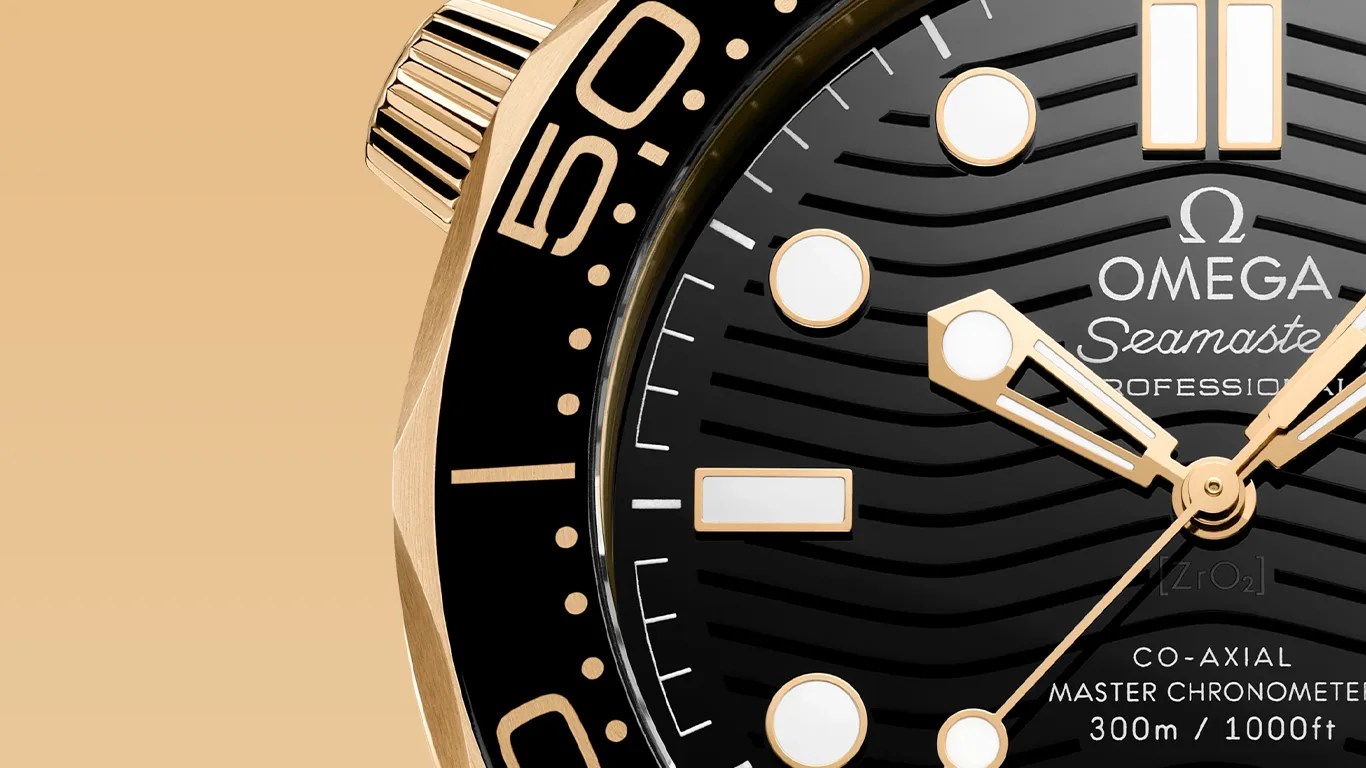 a closeup of an omega seamaster dive watch dial
