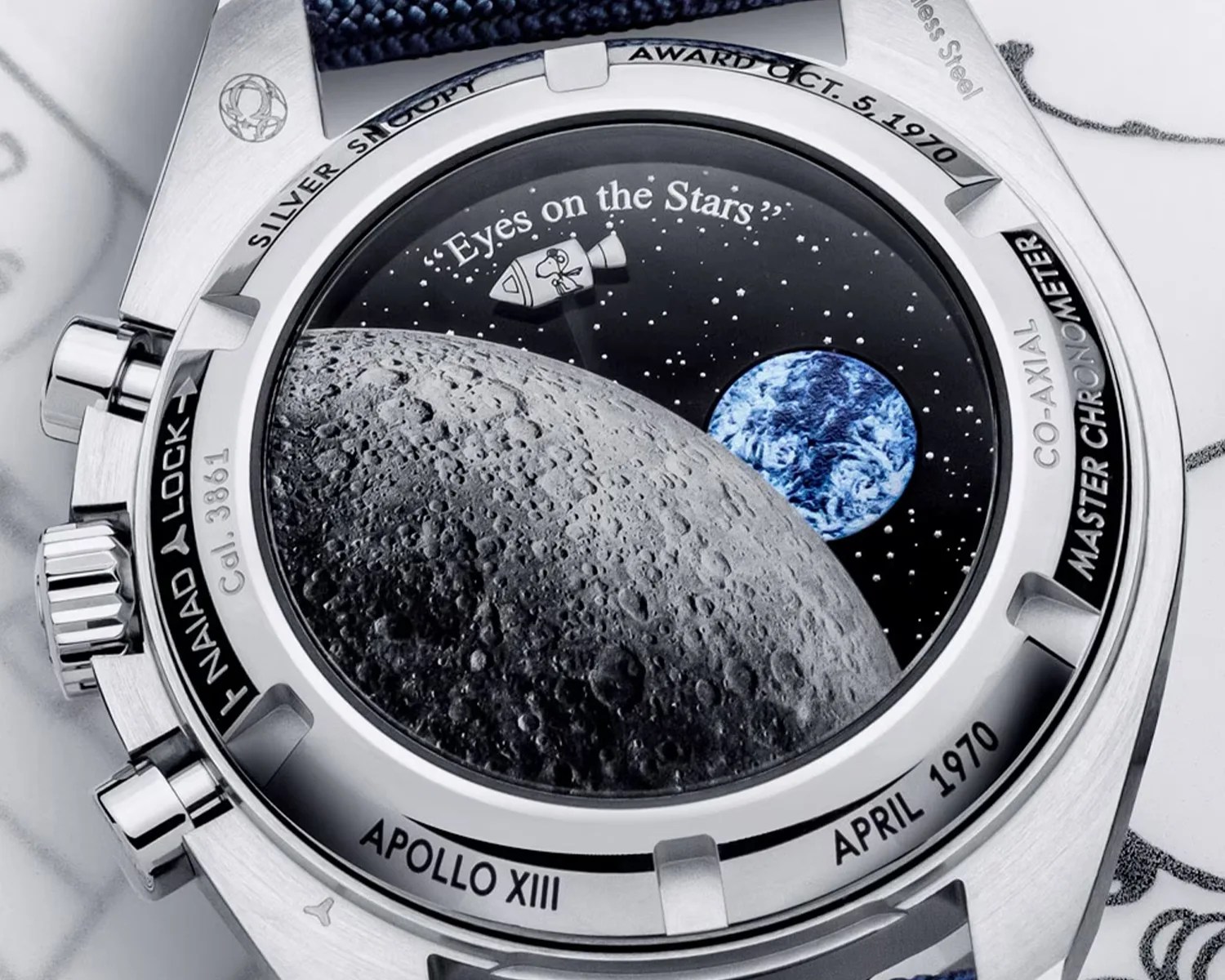 the animated caseback of an omega watch featuring snoopy