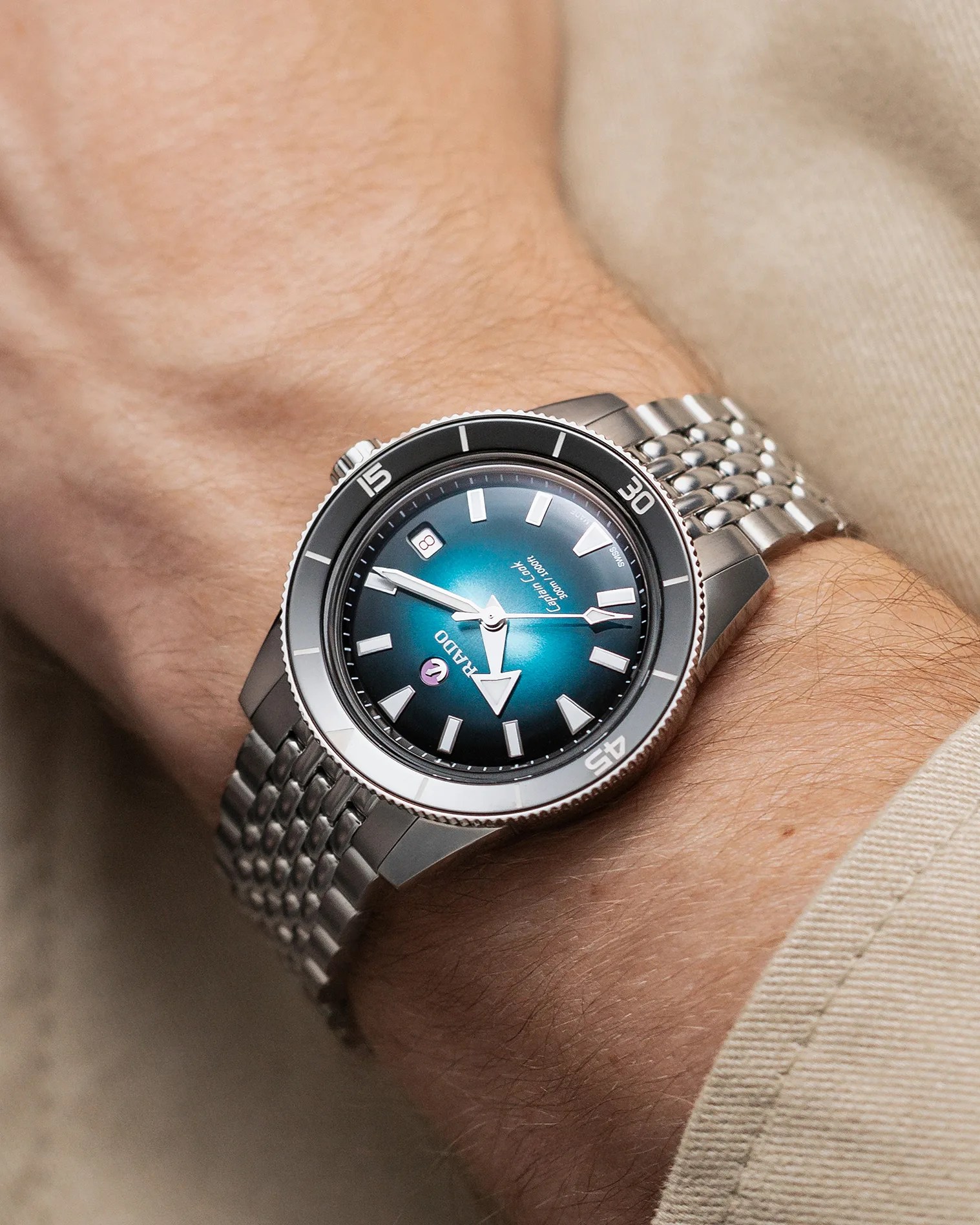 a rado dive watch on a man's wrist
