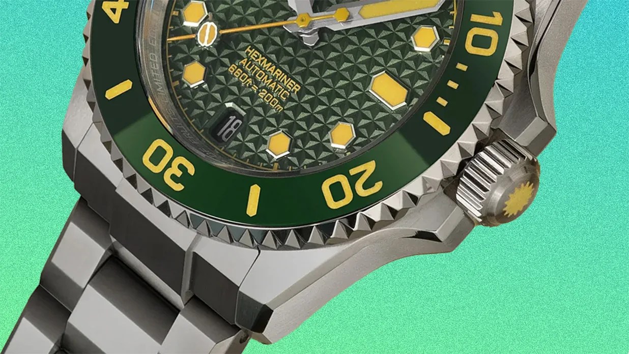 the dial of a green Revolt dive watch
