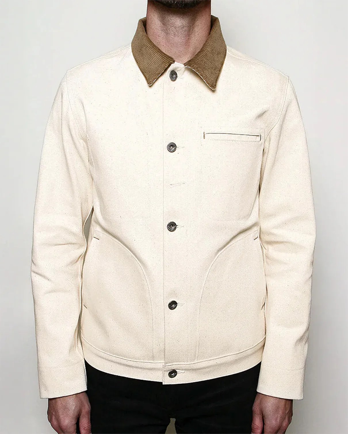 a man wearing an RGT cord collar supply jacket