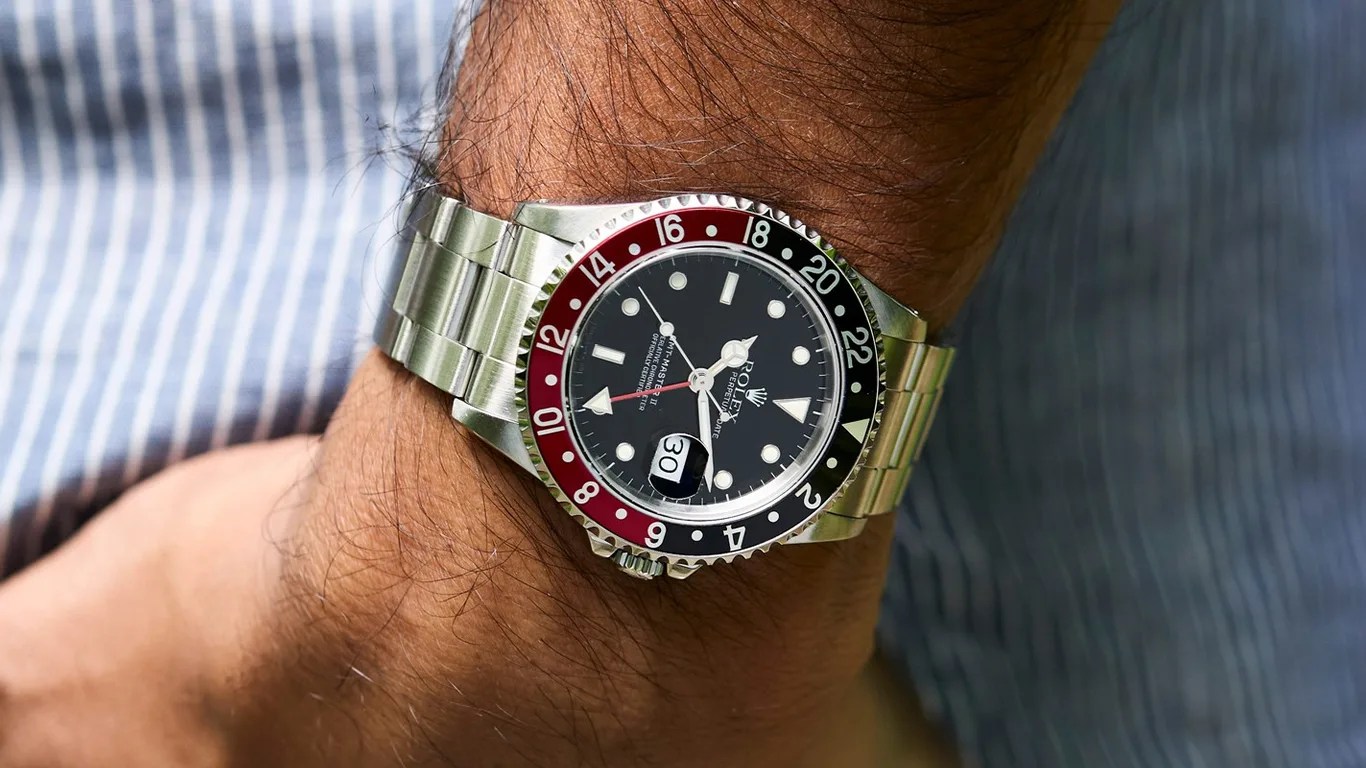 a rolex gmt watch on a mans wrist
