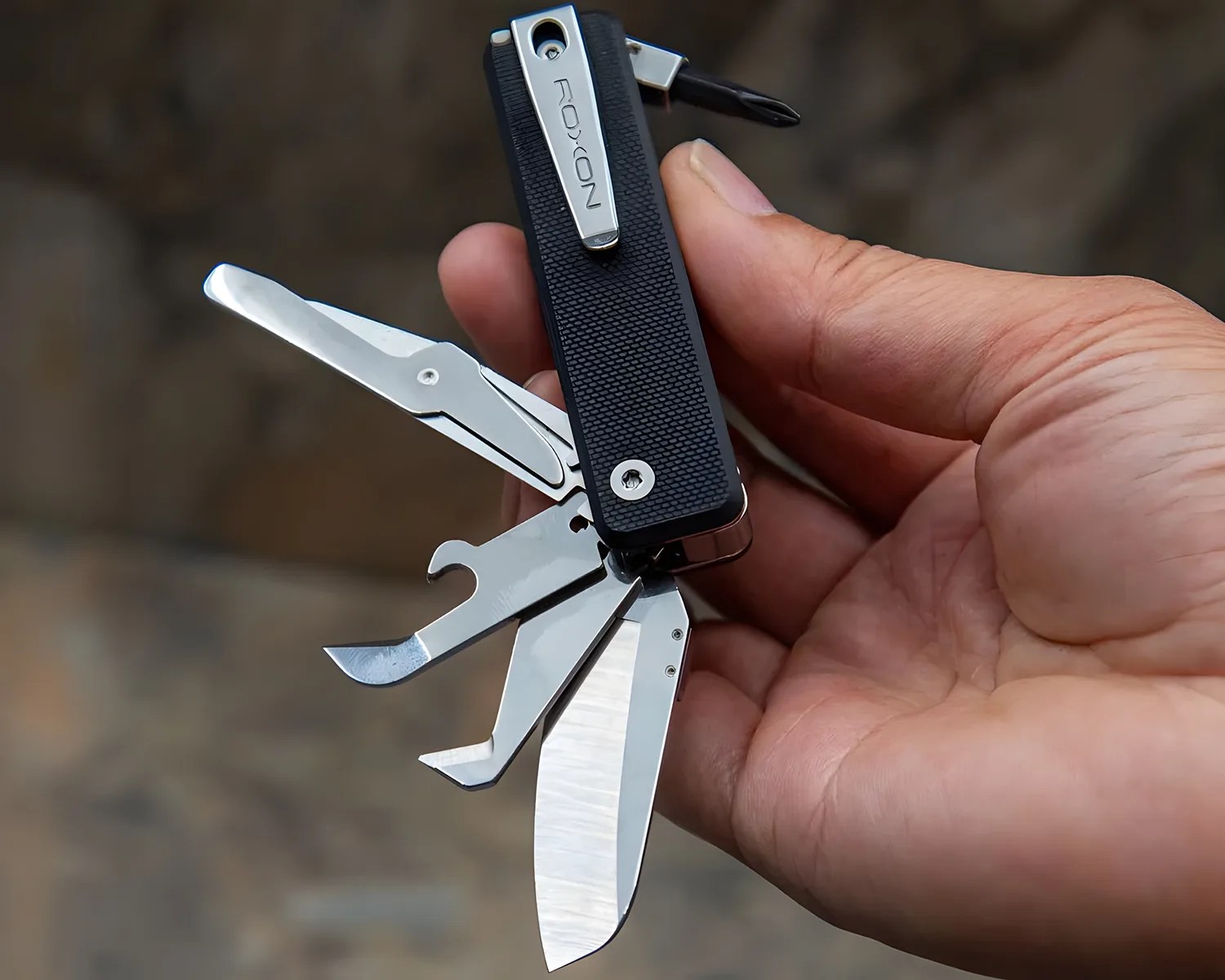 roxon mini flex companion multi-tool in hand