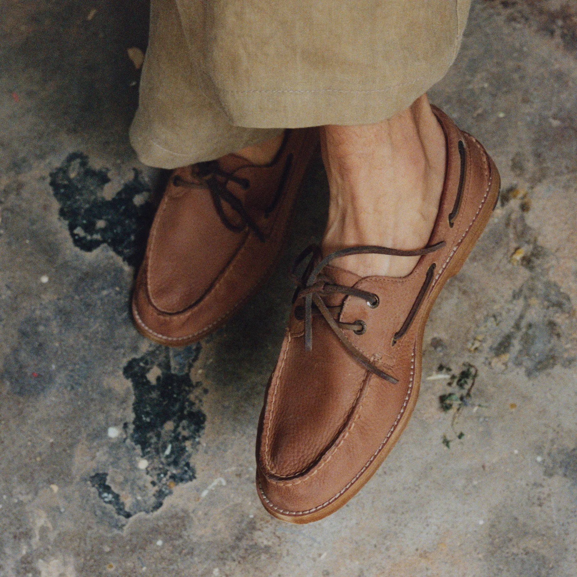 a man wearing boat shoes