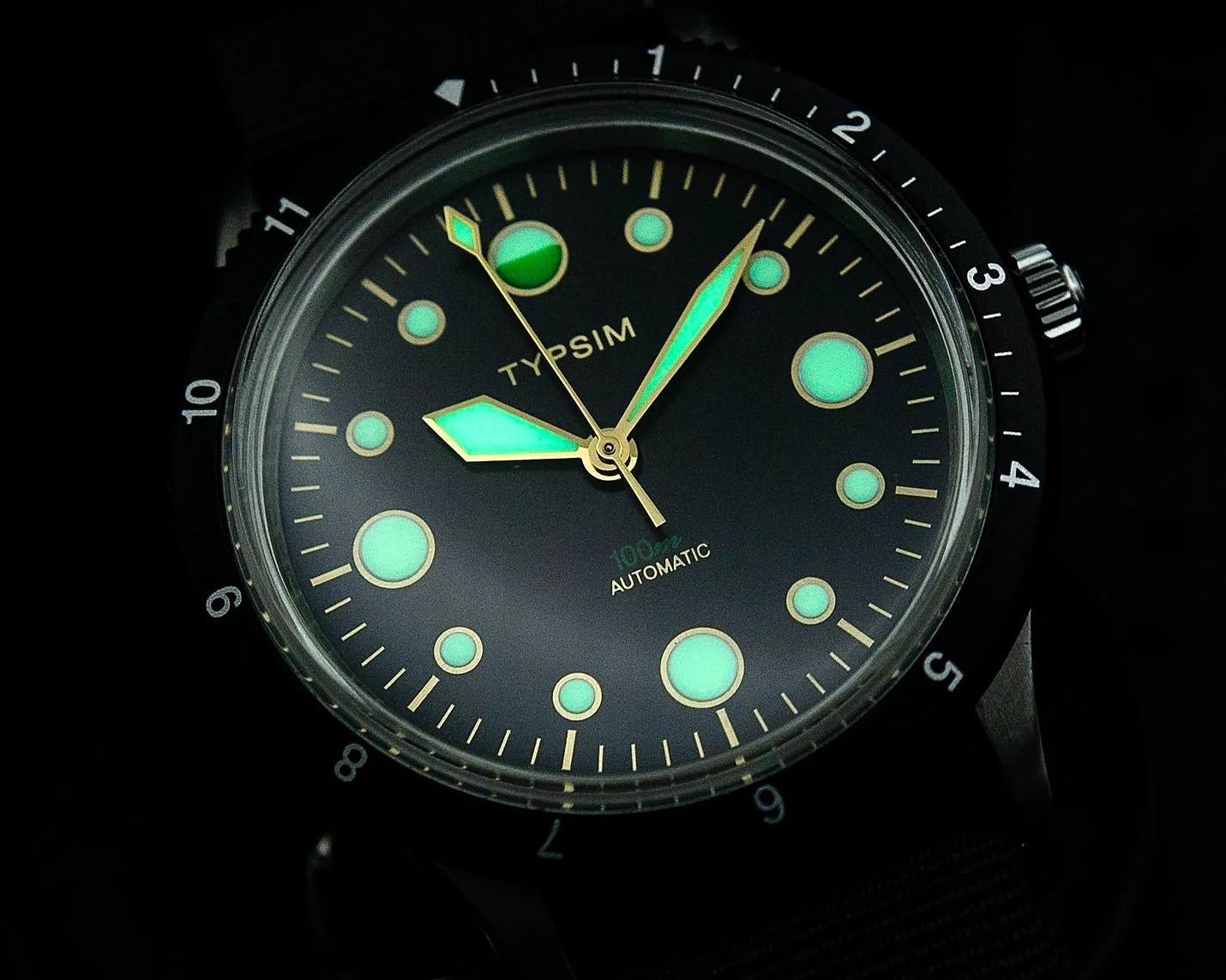 a Typsim dive watch in the dark