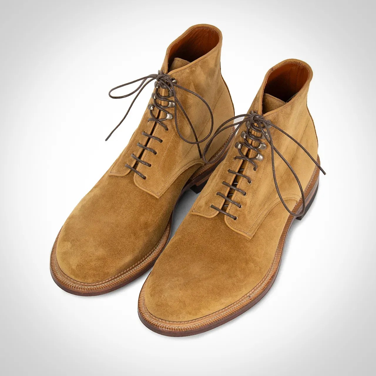 a pair of tobacco suede boots