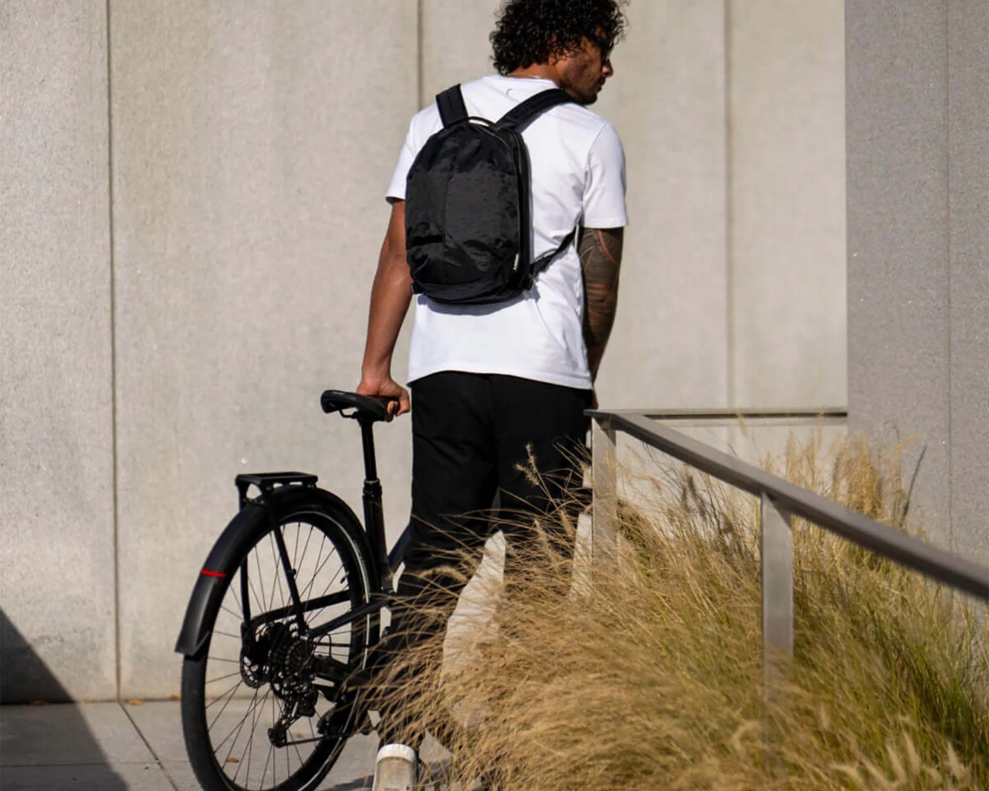 Boundary Supply X-Pac EDC Bag on person outside with bike