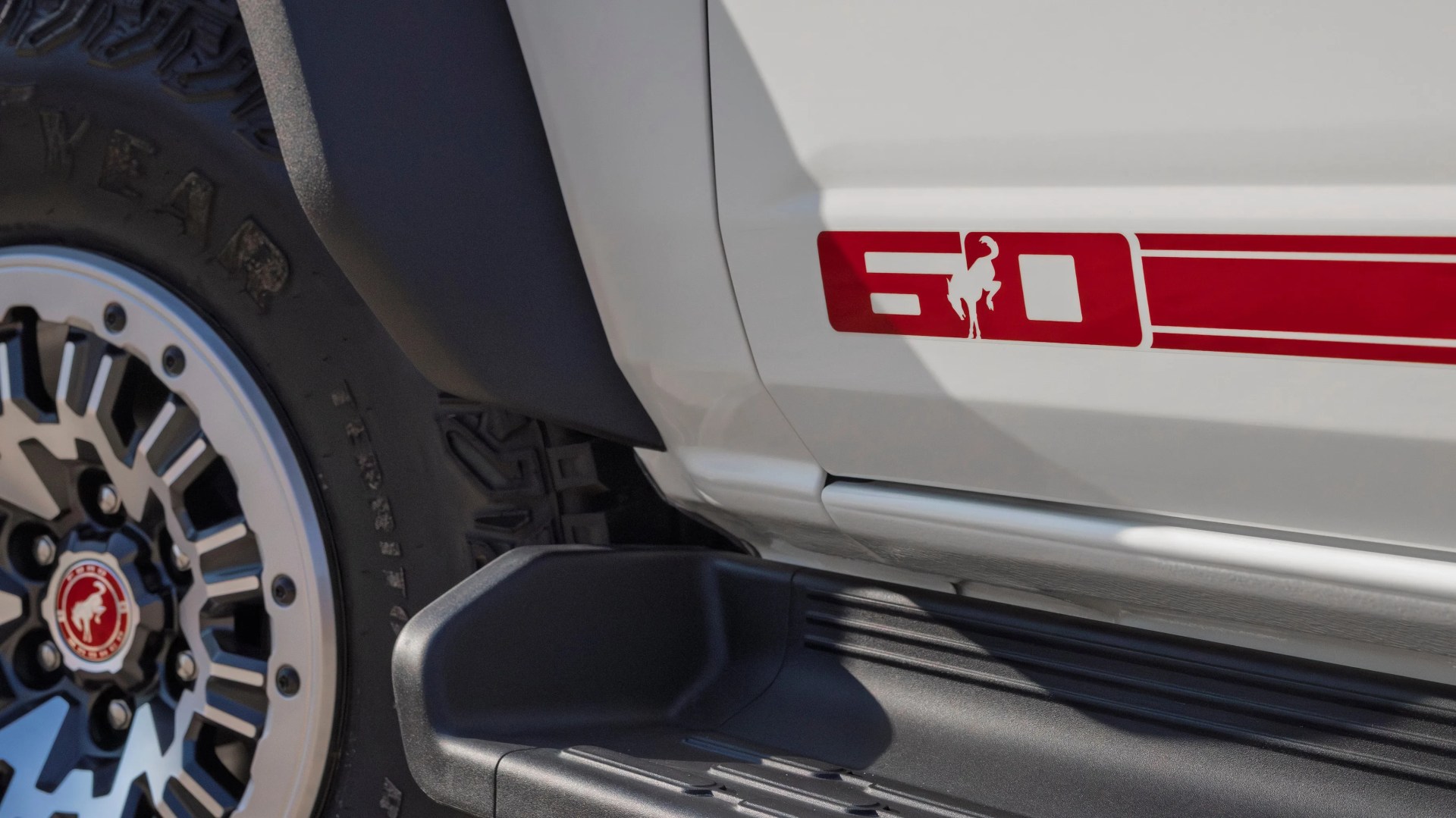 a close-up photo of a ford bronco suv badge