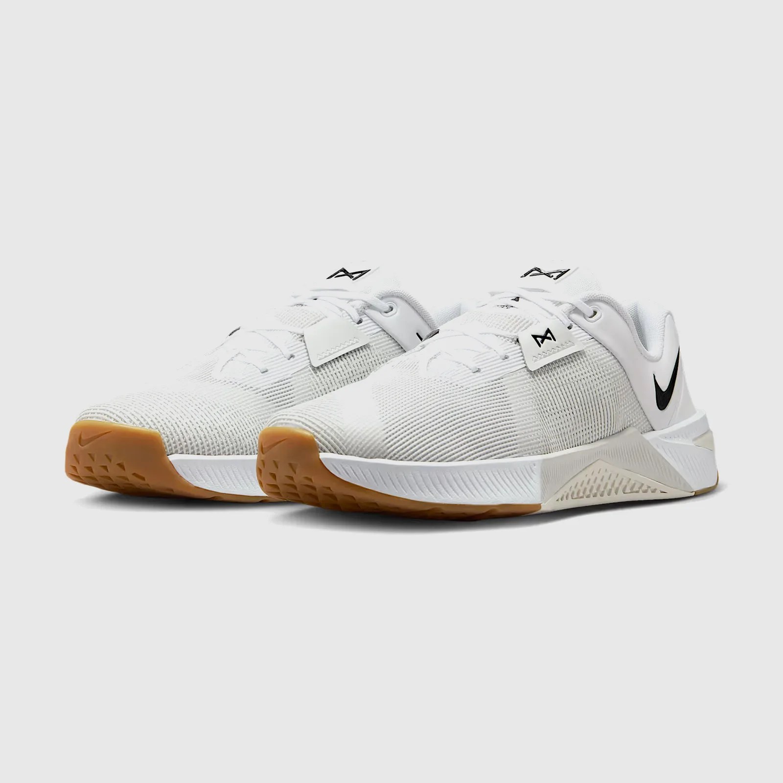 A angled view of view of the Nike Metcon 10 gym shoes in white