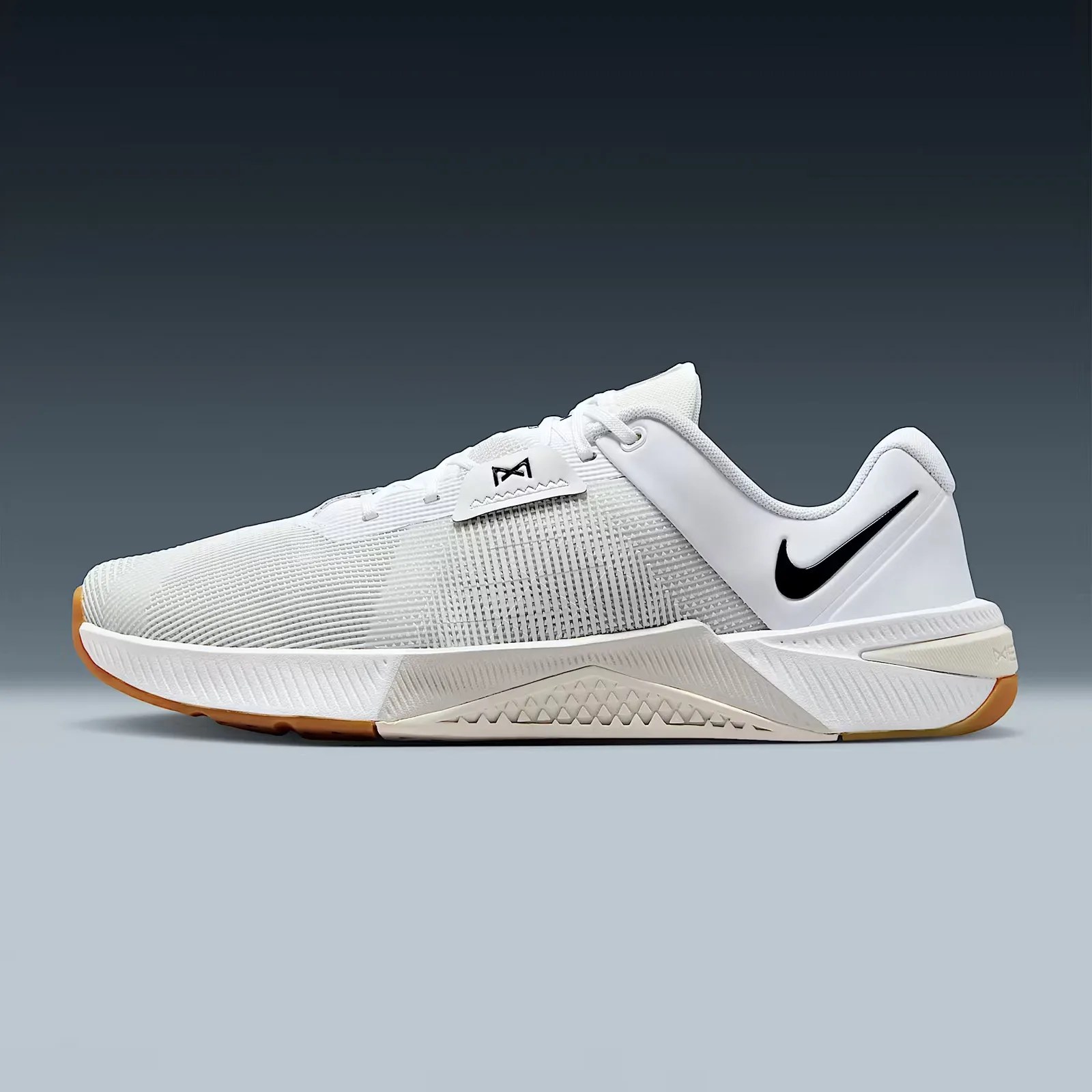 A profile view of the Nike Metcon 10 gym shoe in white
