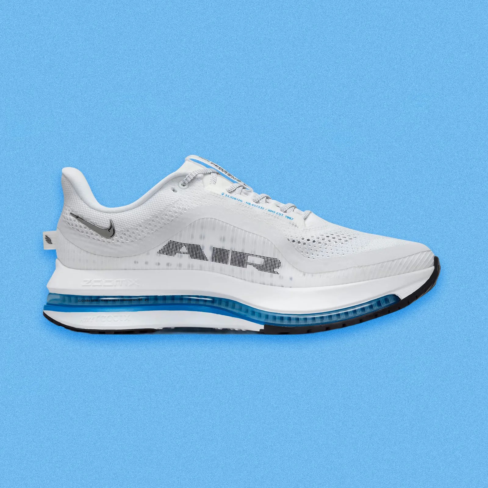 A profile view of the inside edge of the Nike Pegasus Premium in white and photo blue