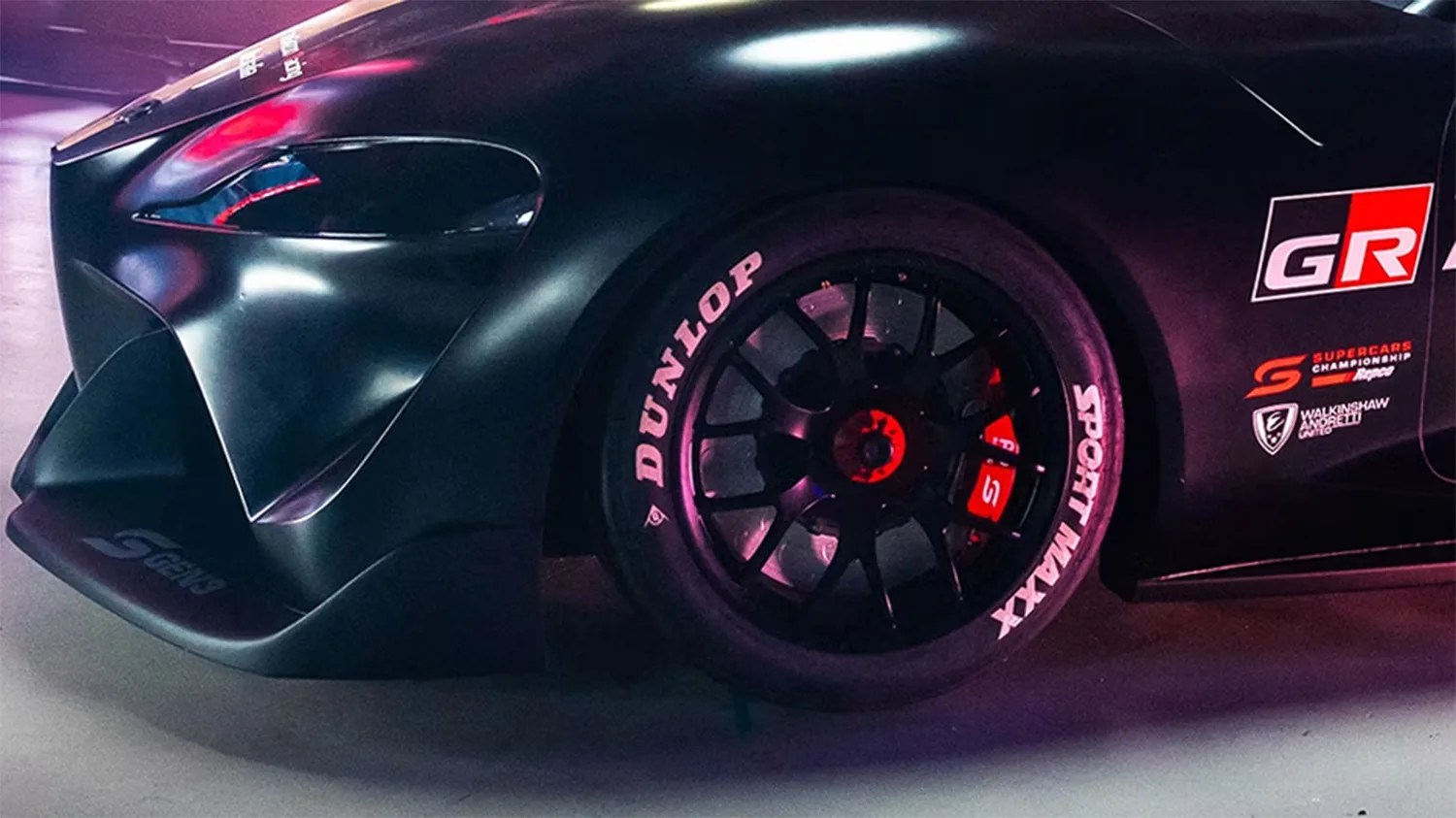 a close-up photo of the front end of a toyota supra race car