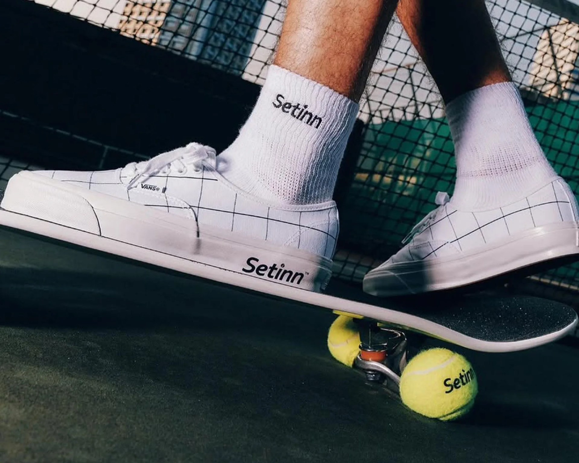 Vans x Setinn Capsule Collection authentics on skateboard on tennis court