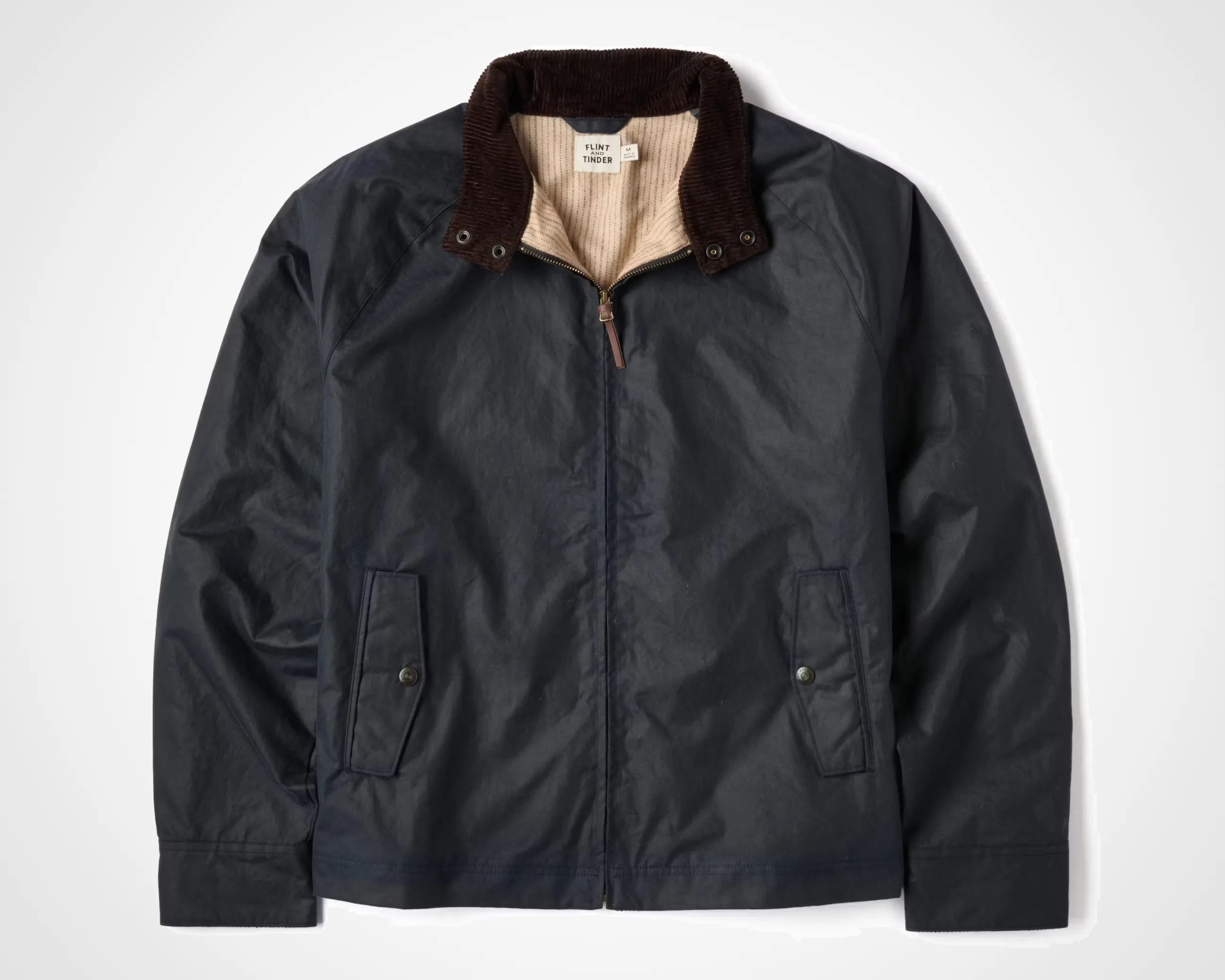 a blue Flint and Tinder waxed harrington jacket