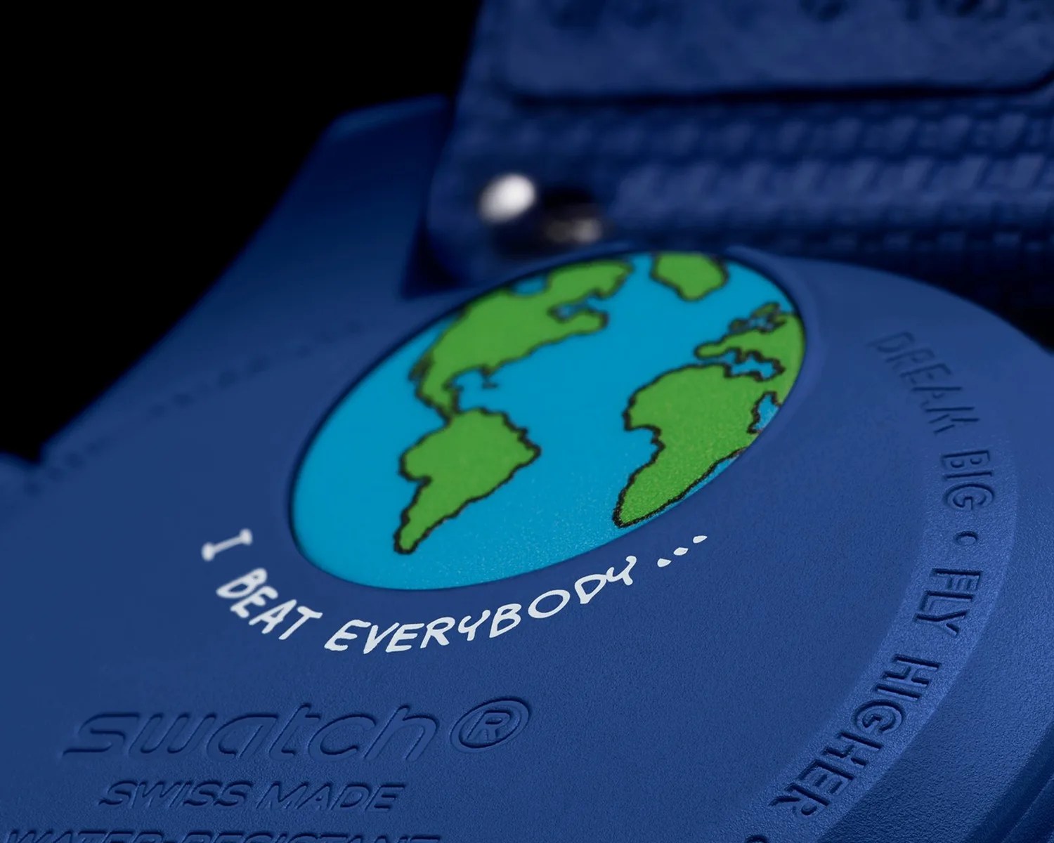 a closeup of a moonswatch watch caseback