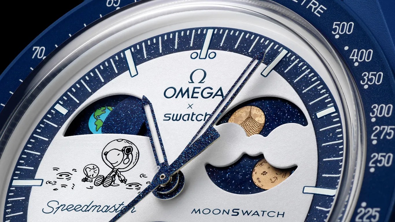 a closeup of a moonswatch watch dial